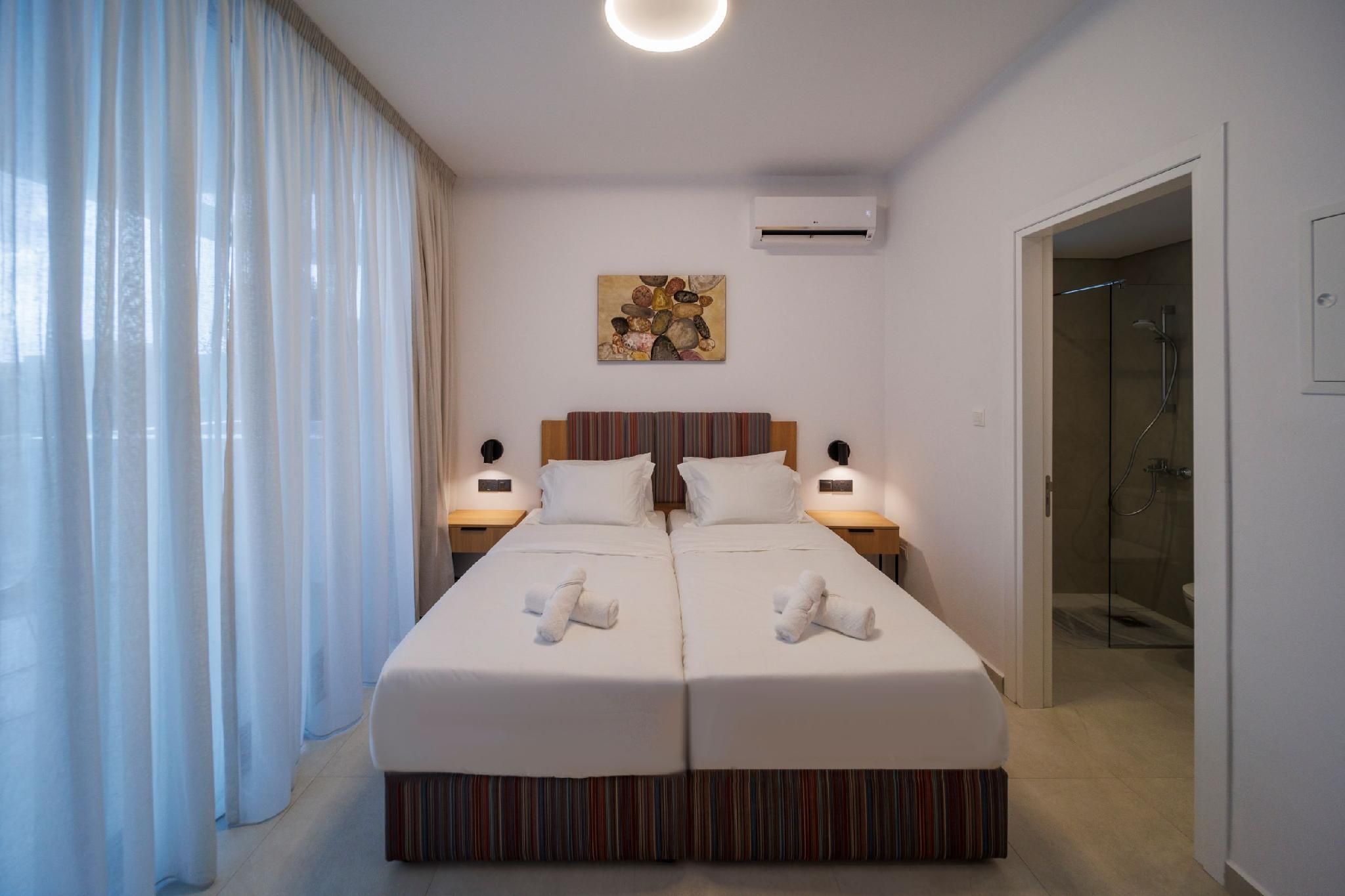 Triple Room - 1 Double Bed and 1 Single Bed