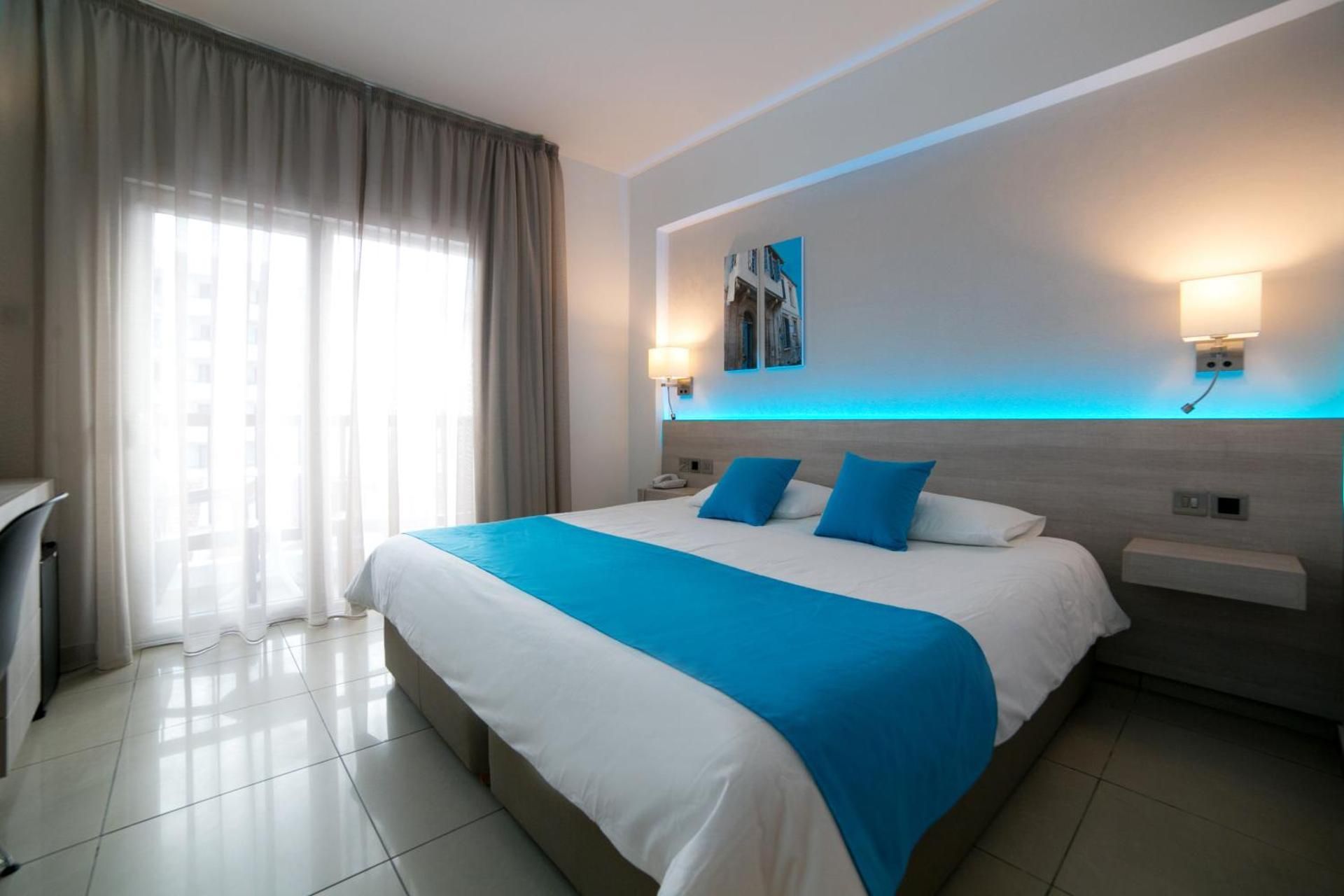 Quadruple Room with Side Sea View (2 Adults + 2 Children)