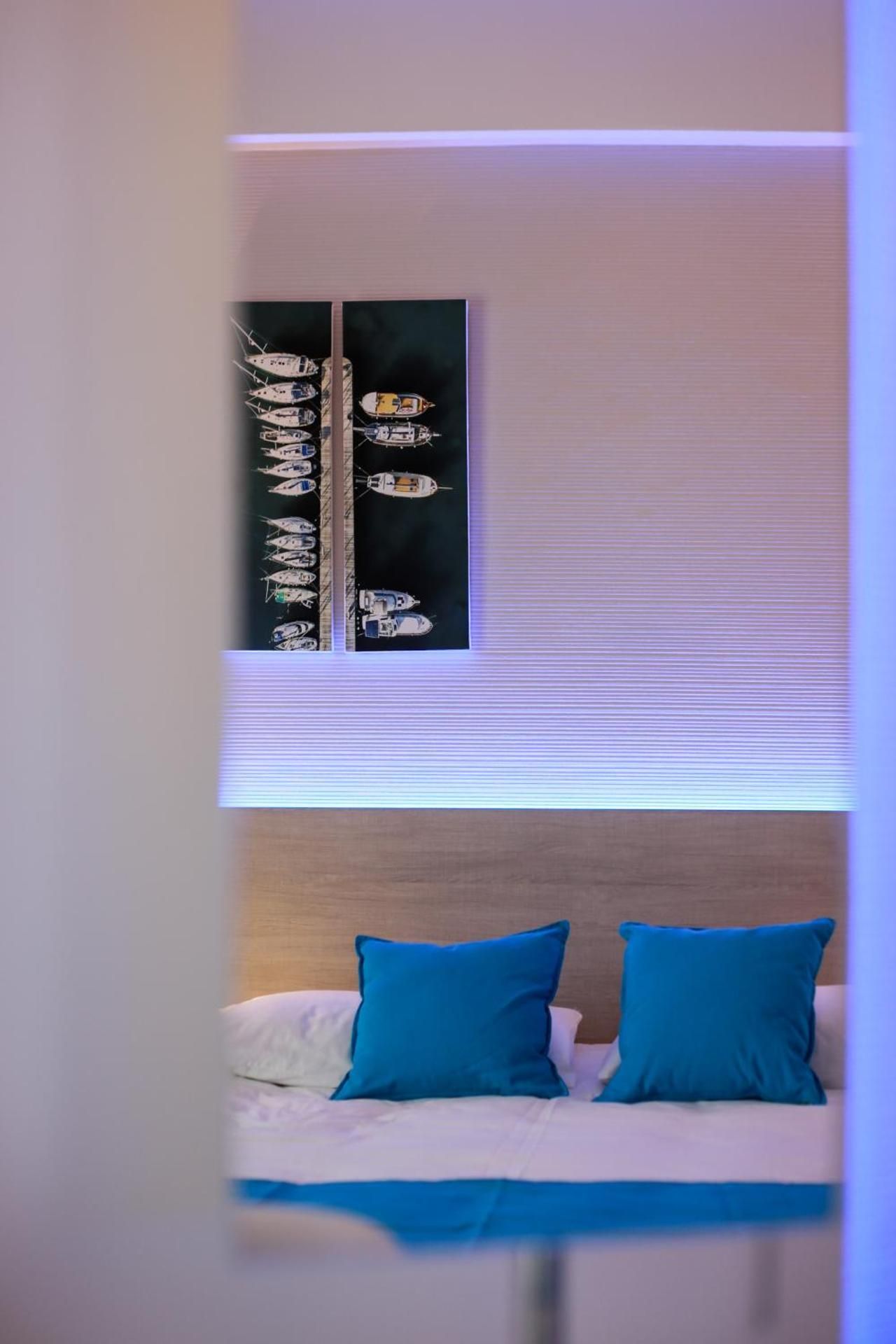 Quadruple Room with Side Sea View (2 Adults + 2 Children)