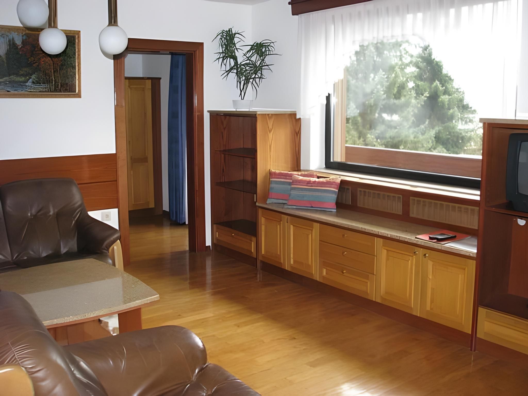 Two-Bedroom Apartment with Balcony and Garden View