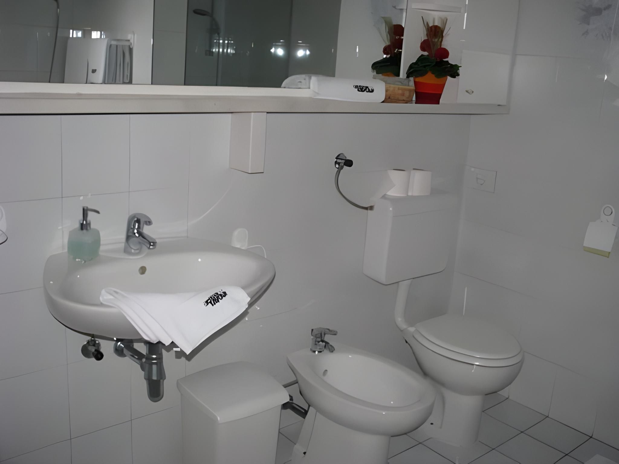 Two-Bedroom Apartment with Balcony and Garden View