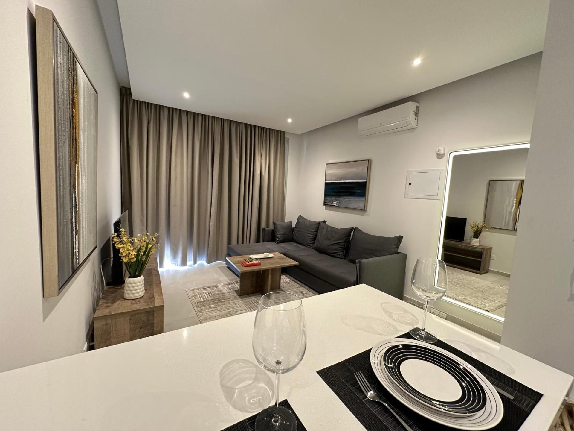 One-Bedroom Apartment with Balcony and City View