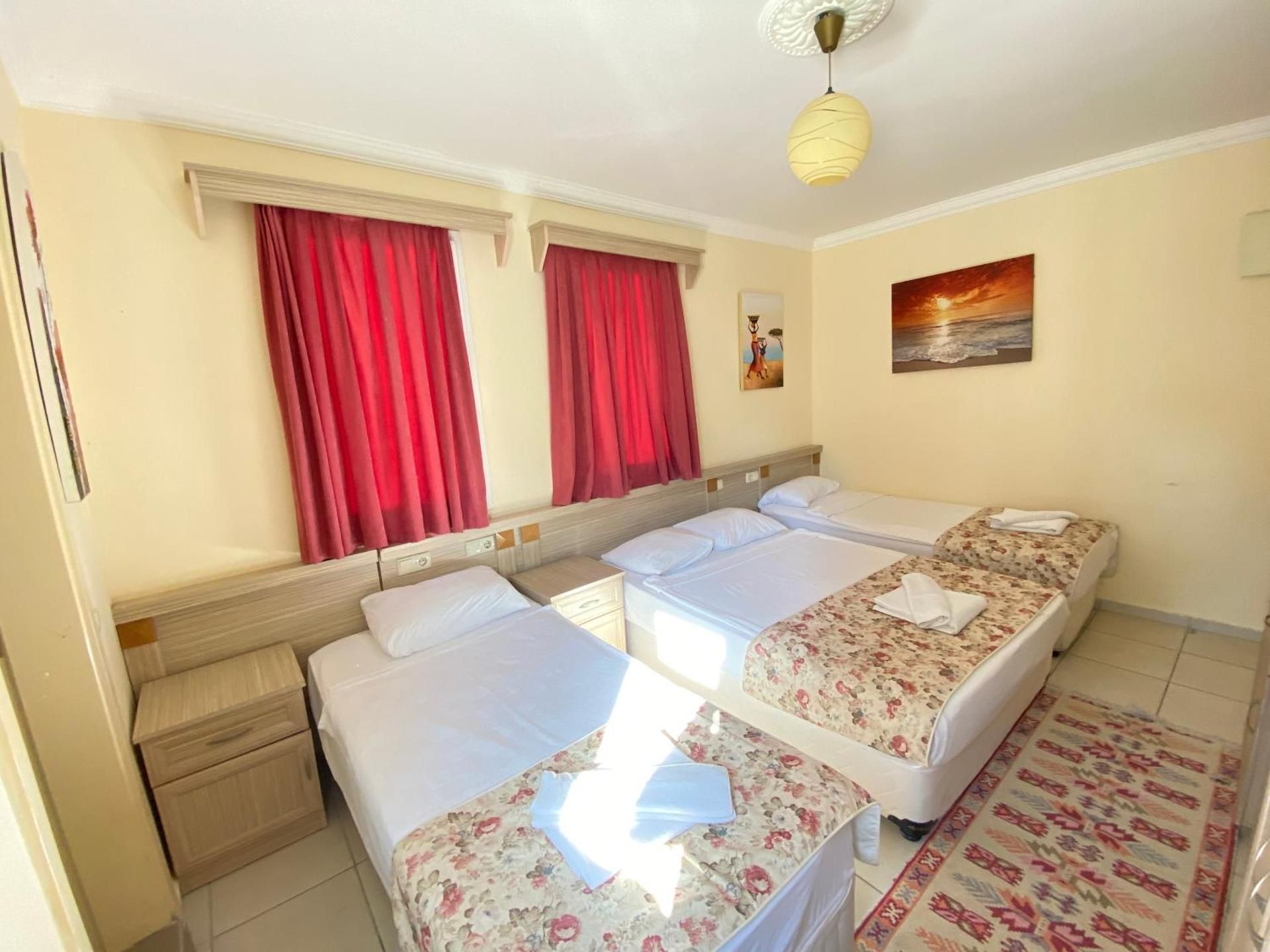 Deluxe Room with 4 Single Beds