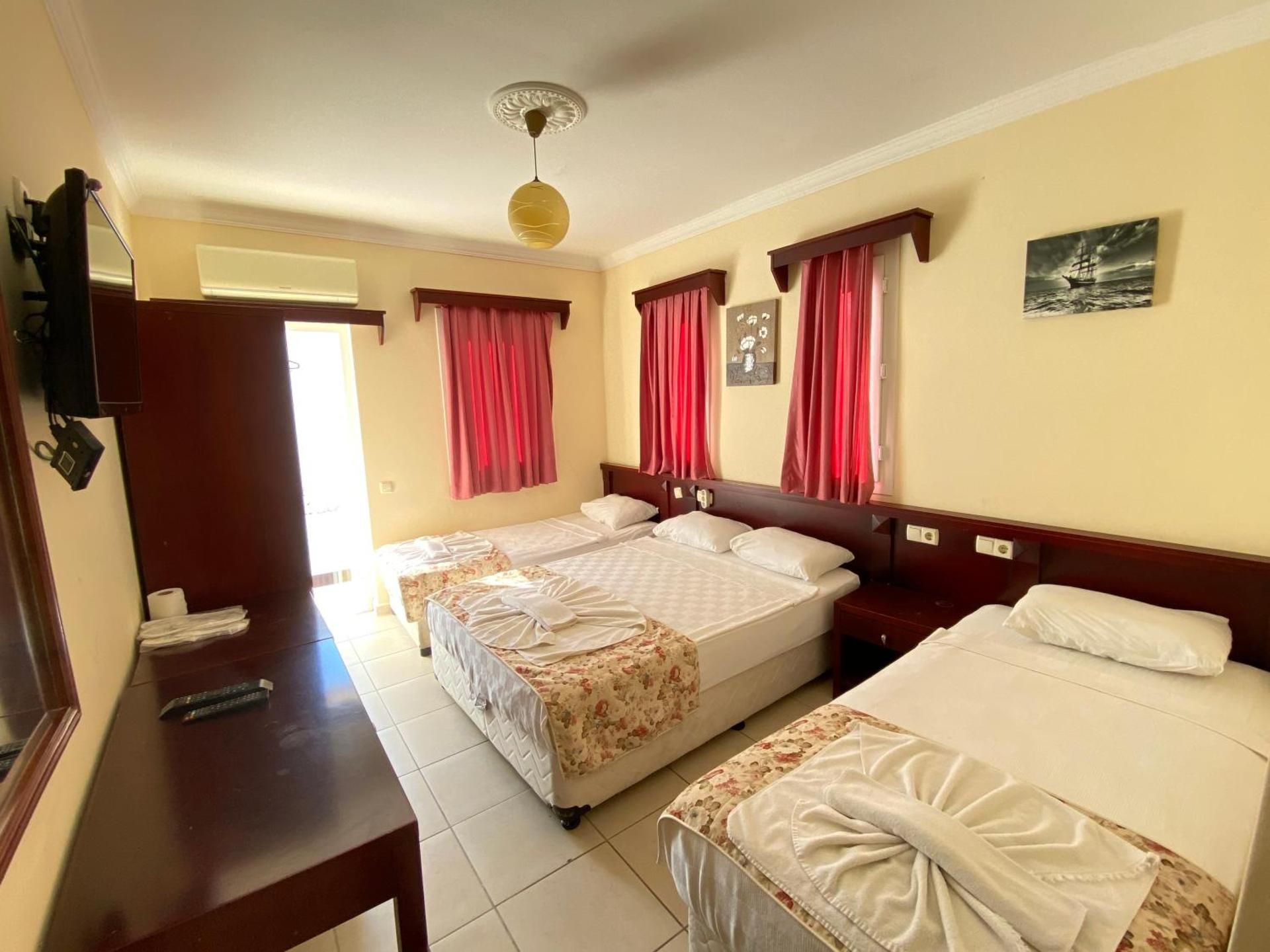Deluxe Room with 4 Single Beds