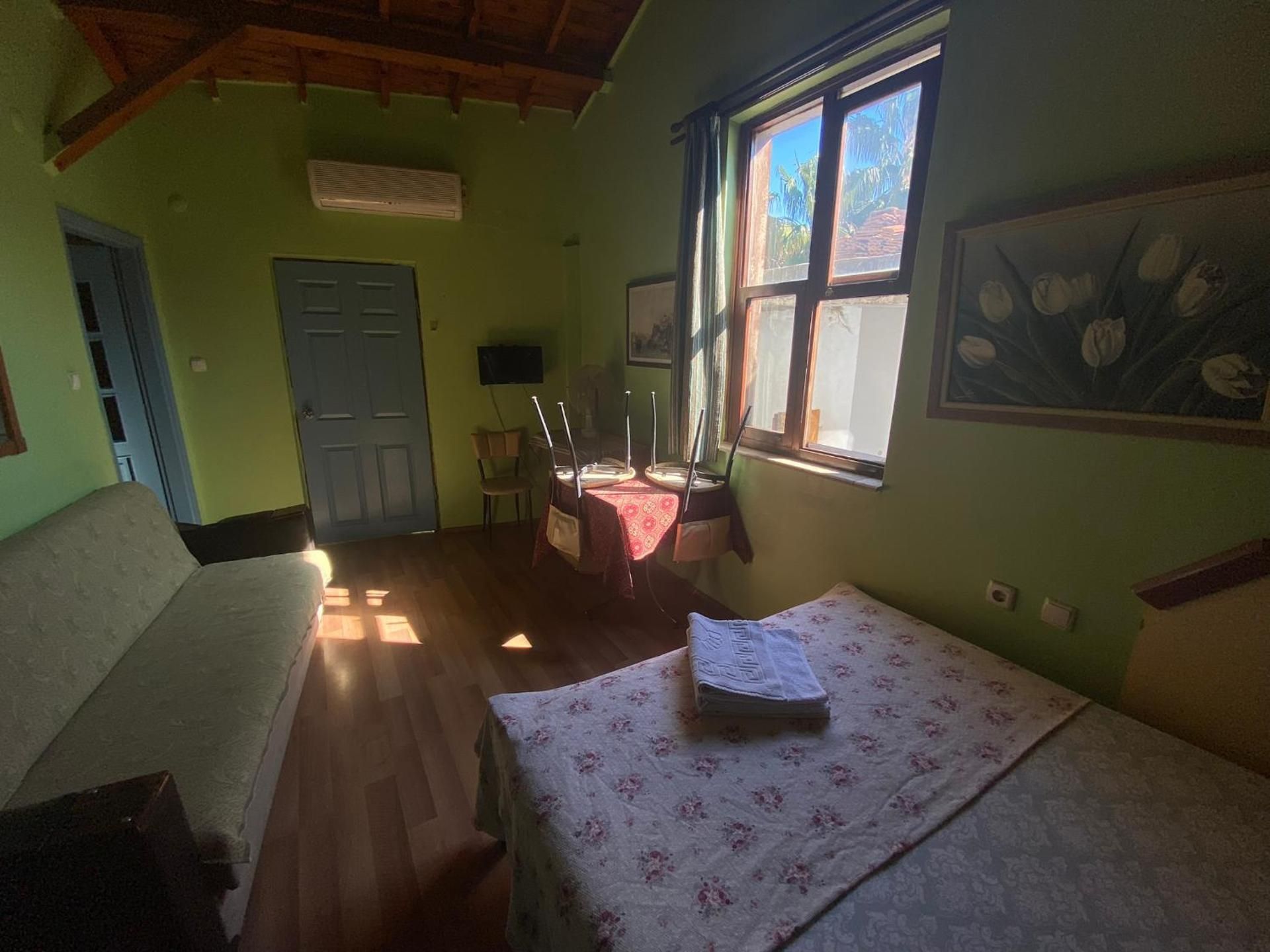 Quadruple Room with Private Bathroom