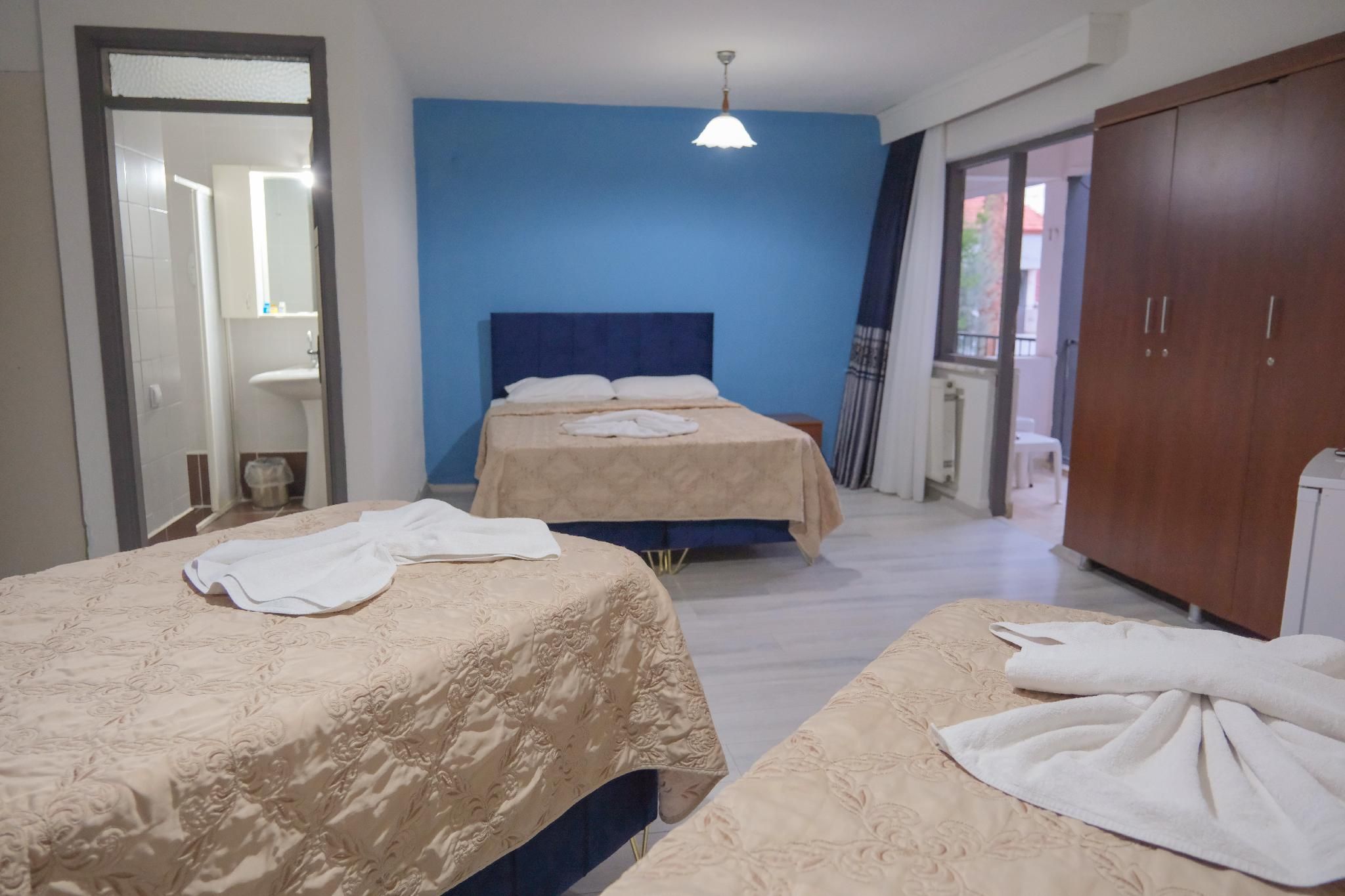 Standard Triple Room with Balcony