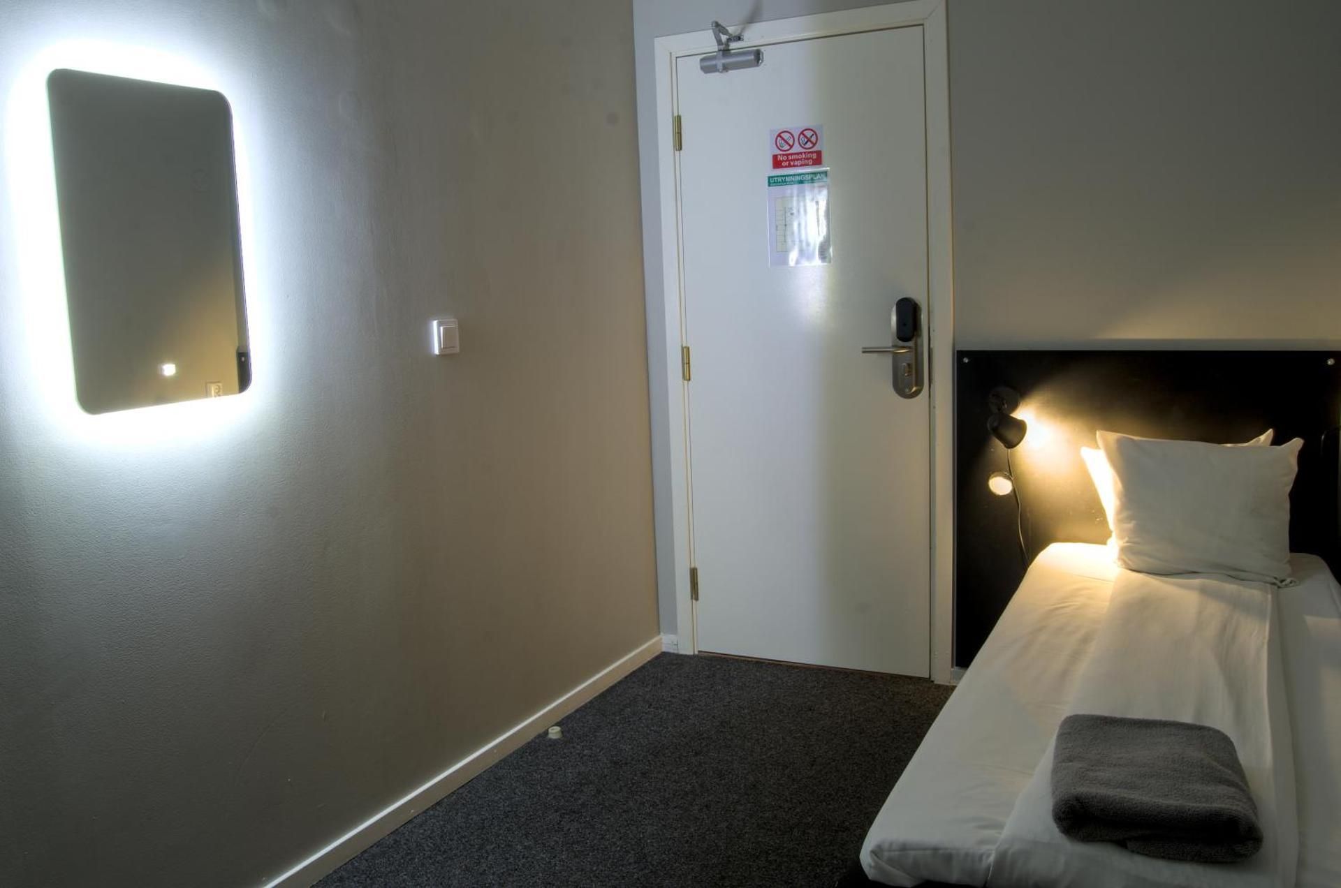 Single Room with Shared Shower and Toilet - No Window