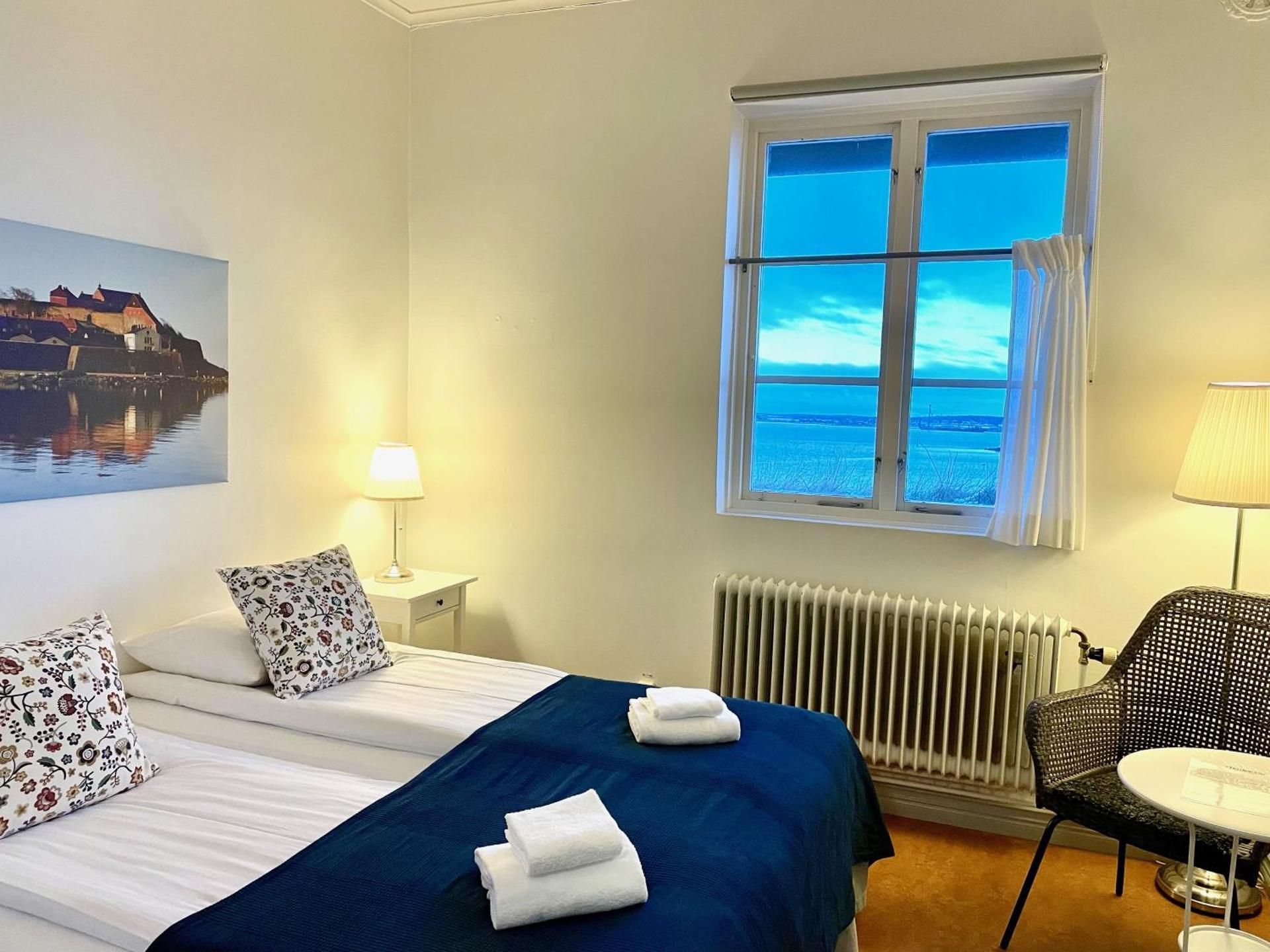 Fastningens Standard Twin Room Sea View with Shared Bathroom
