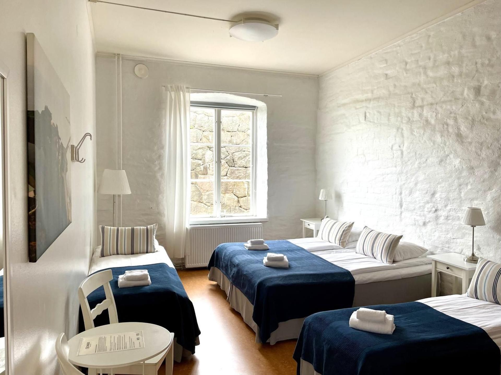 Standard Quadruple Room with Shared Bathroom