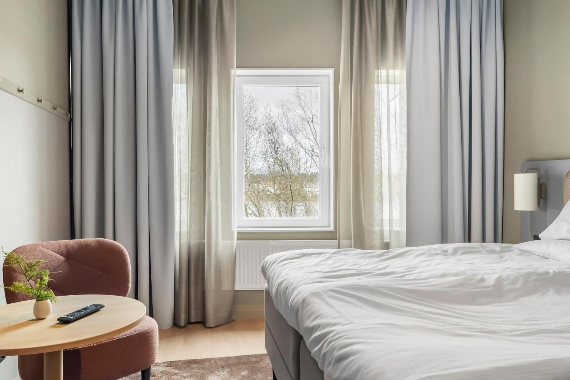 Family Room with Two Single Beds and One Bunk Bed - View over Klarälven