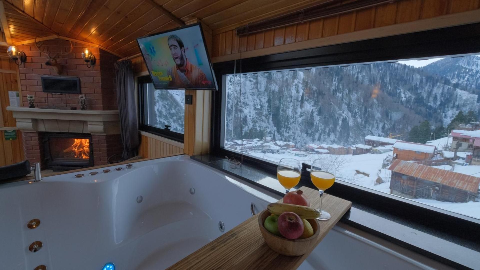 Junior Suite with Fire Place and Hot Tub - Waterfall View