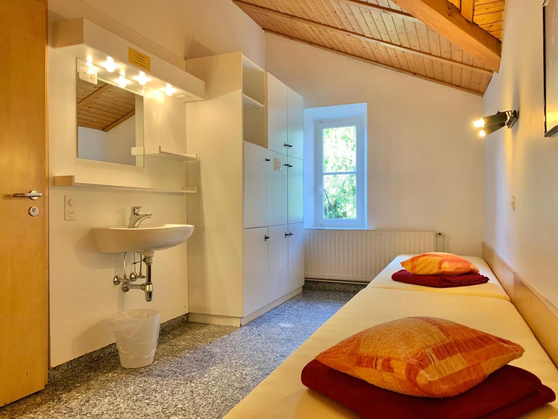 Private Dormitory Room with Shared Bathroom (8 adults)