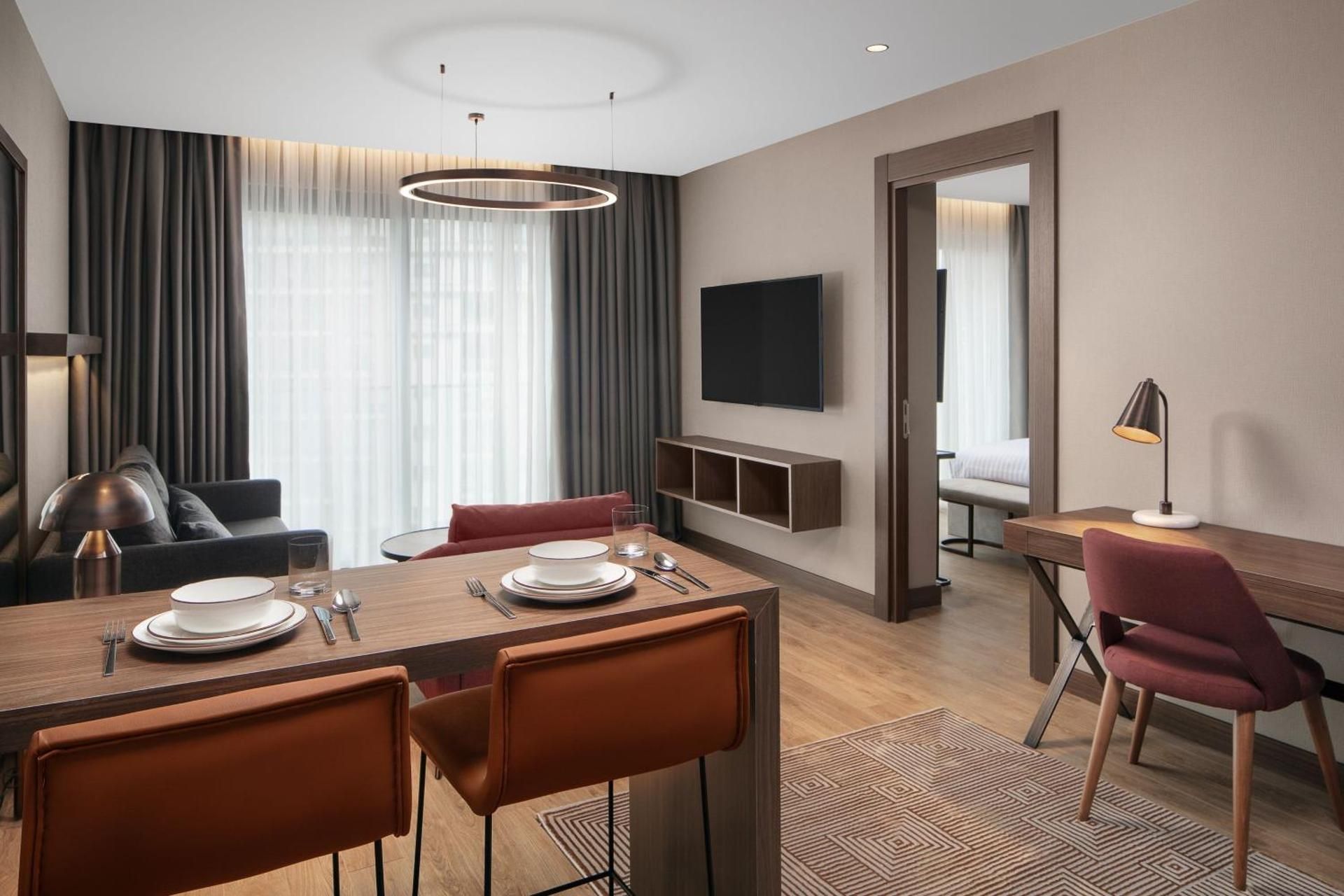 One-Bedroom King Suite with Sofa Bed and City View