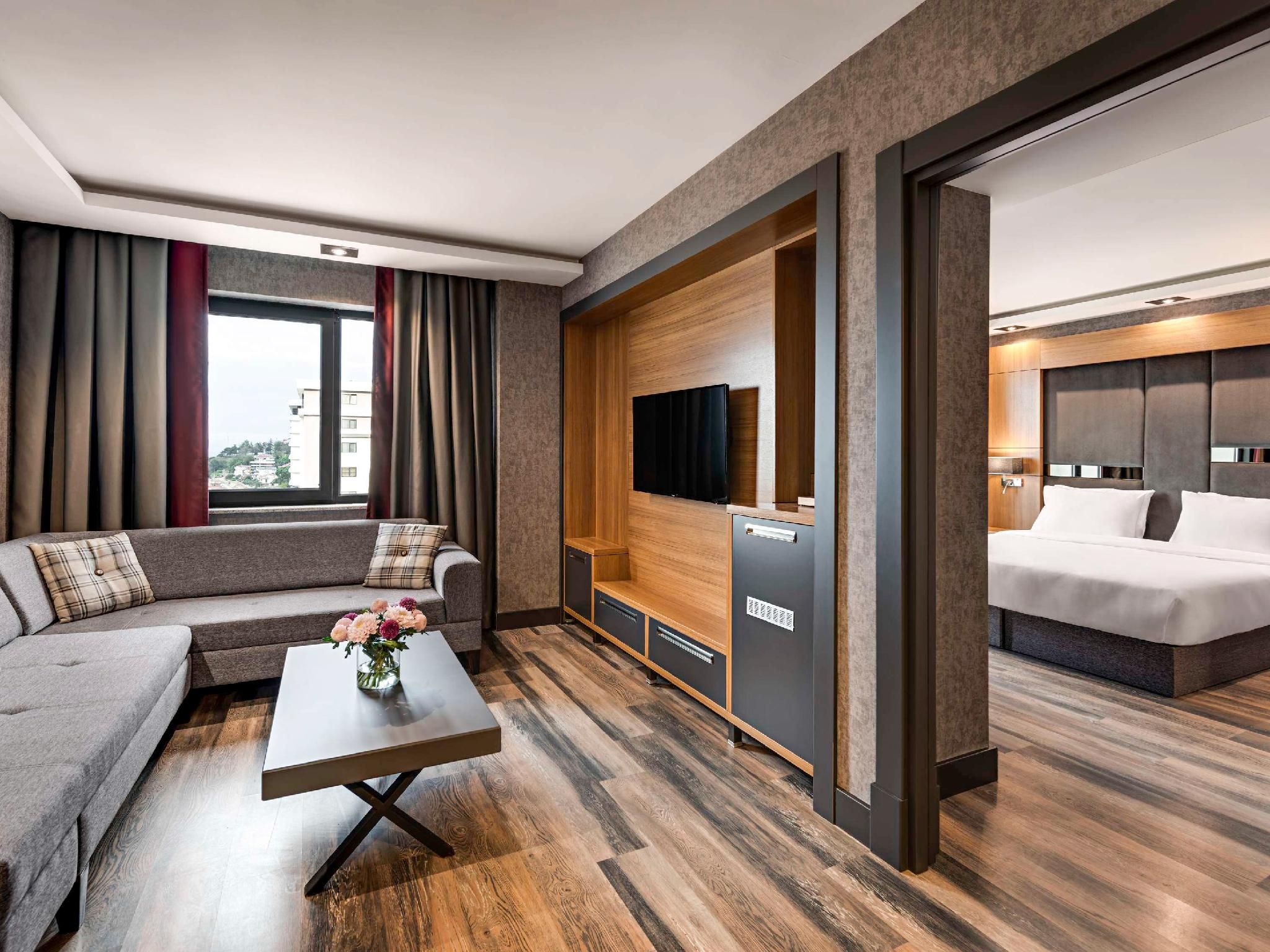 Family suite room with 1 double and 2 single beds