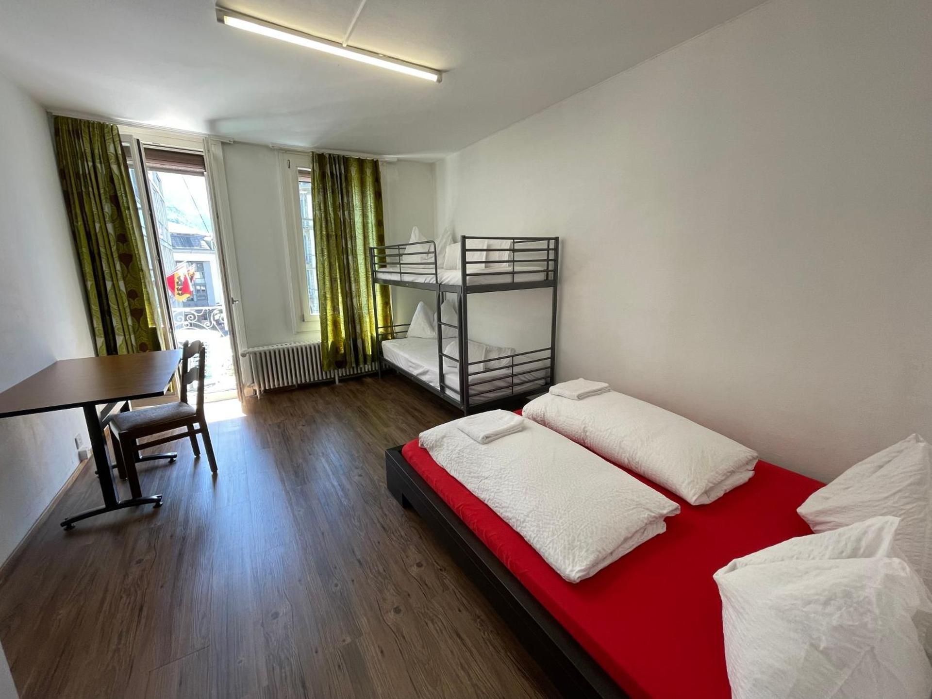 Quadruple Room with Shared Bathroom