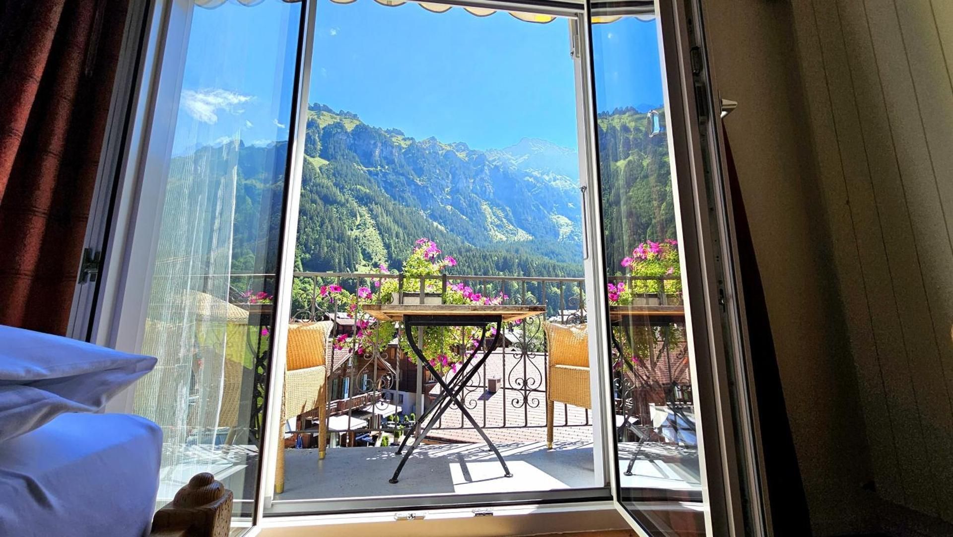 Superior Family Room with Balcony and Mountain View