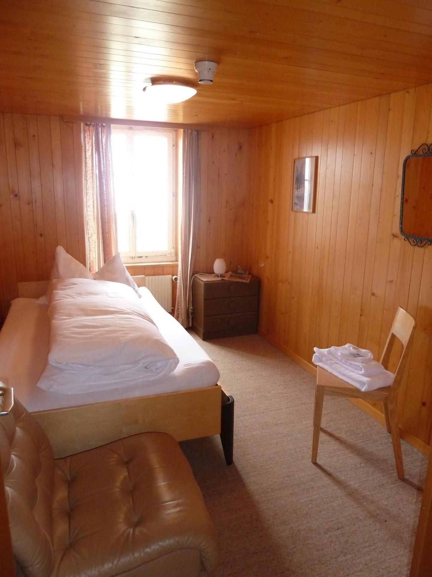 Single Room with Shared Shower and Toilet