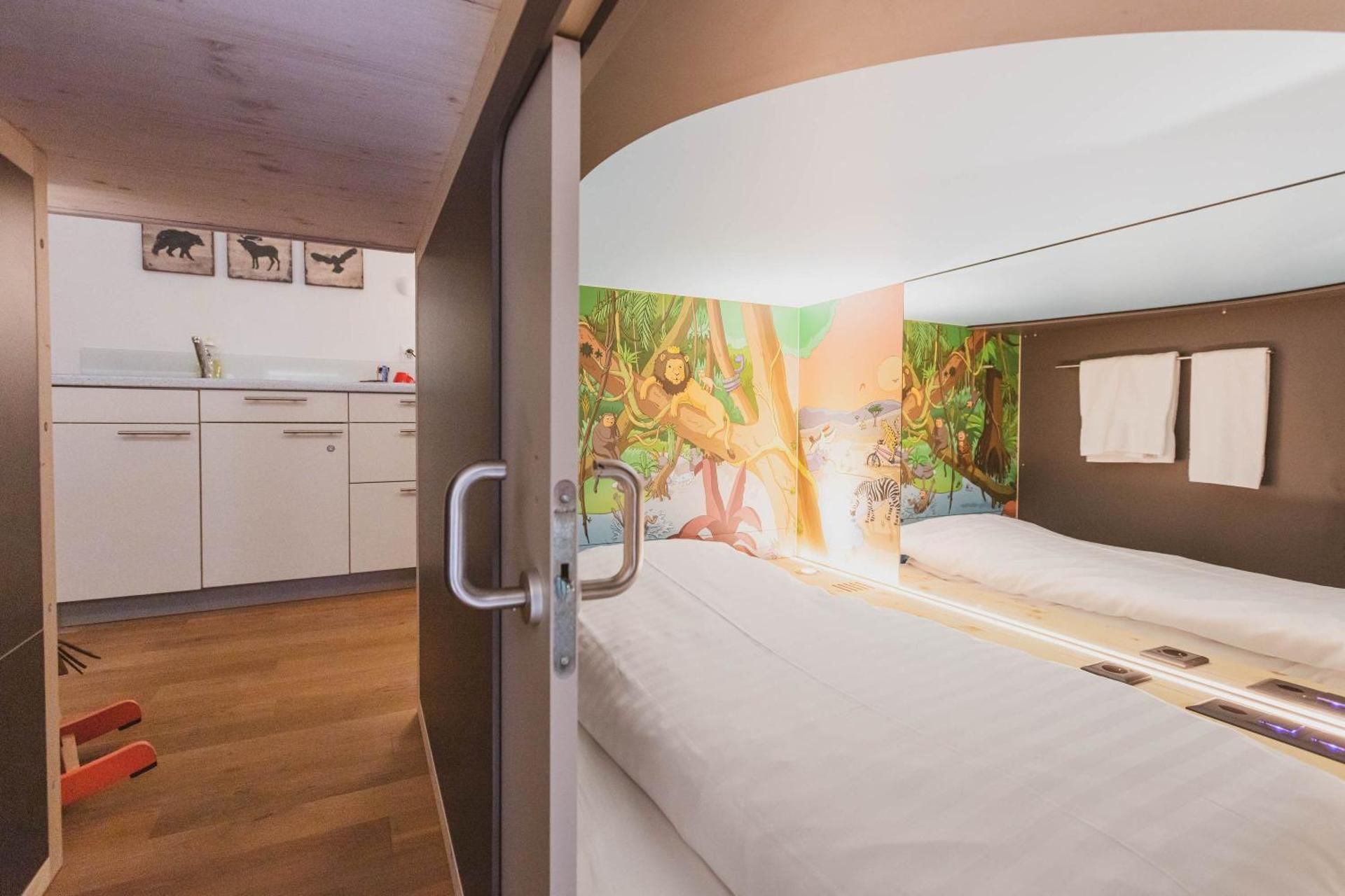 Rainforest Family Room up to 4 with 2 capsule beds and shared bathroom