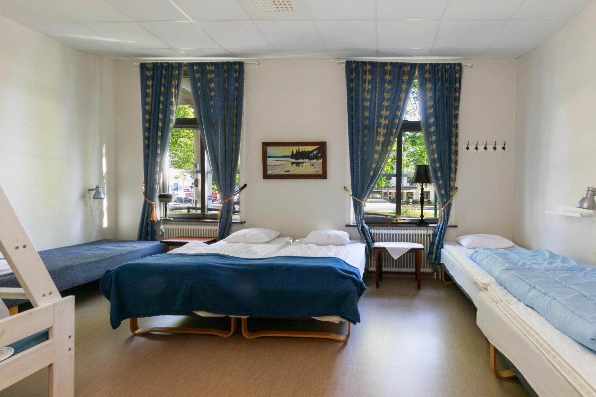 Quadruple Room with Shared Bathroom