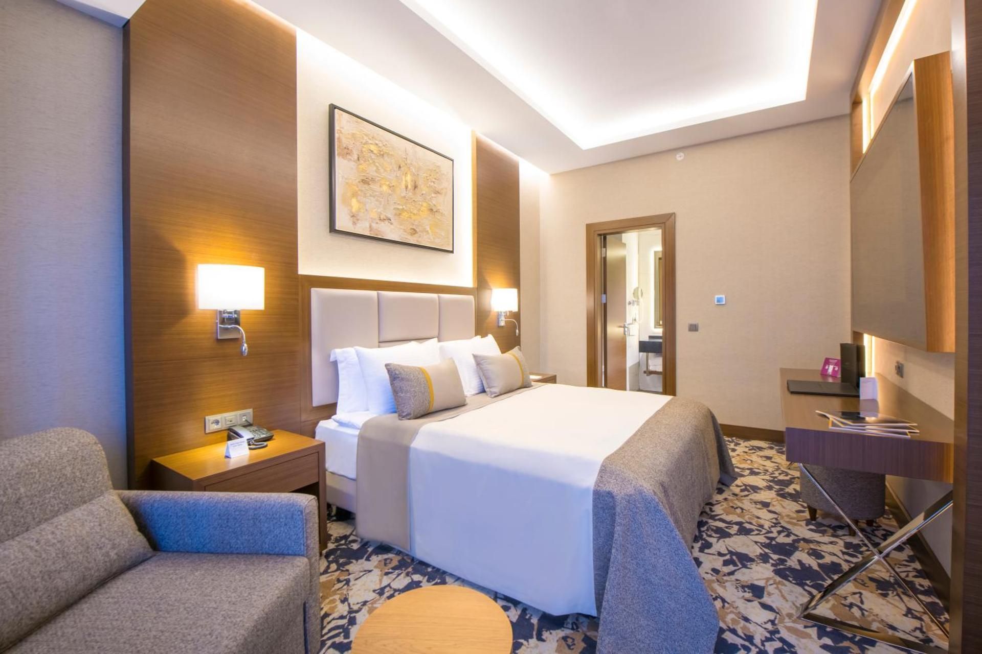 Junior King Suite with Sofa Bed and Balcony