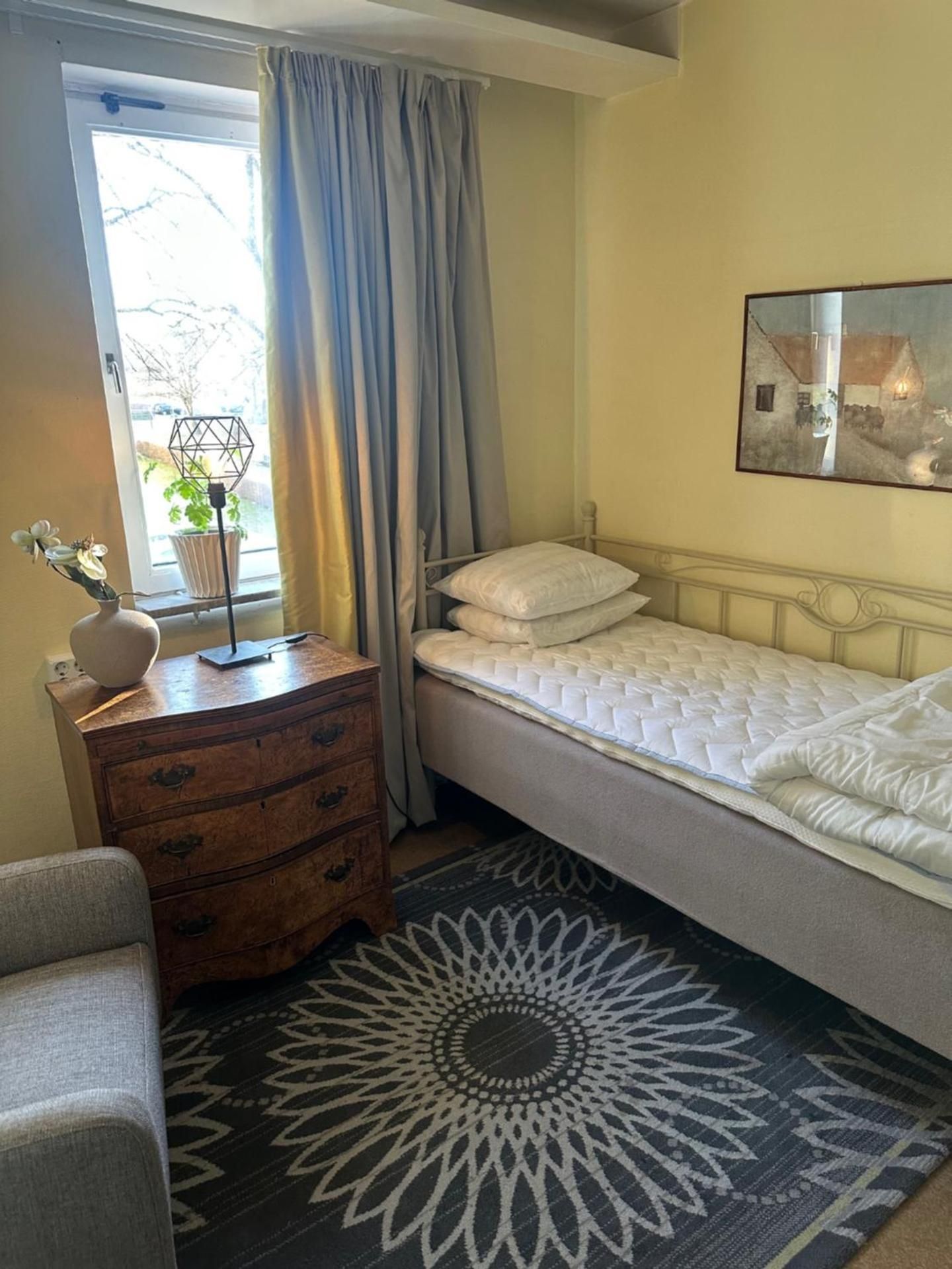 Single Room with Shared Shower and Toilet