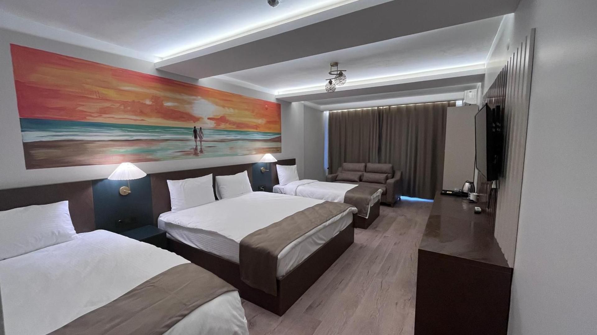 SAR-PER Hotel Quadruple Room