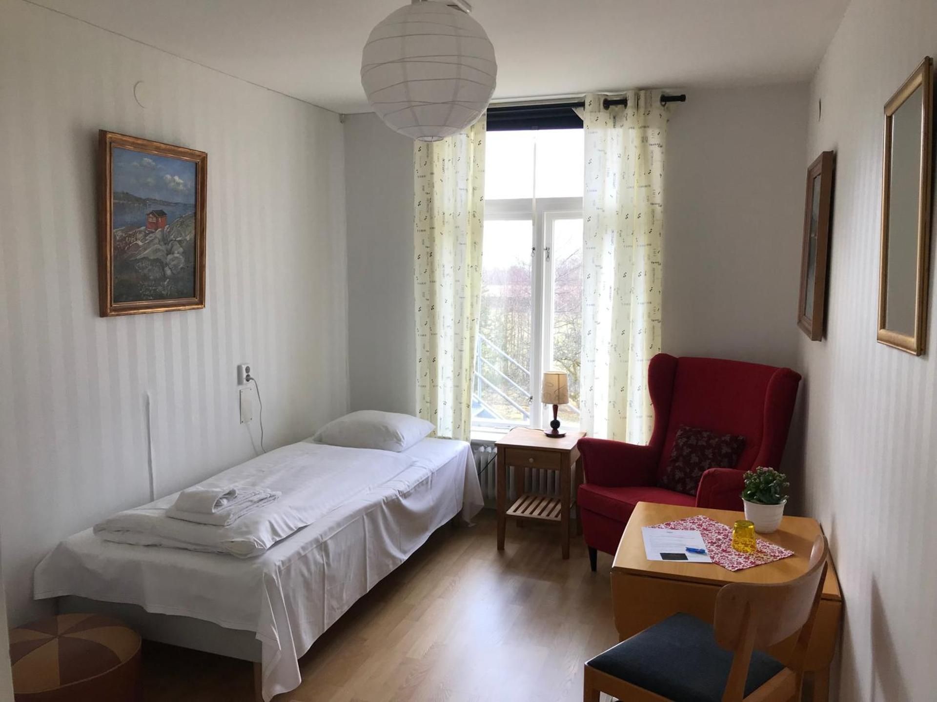Single Room with Shared Shower and Toilet