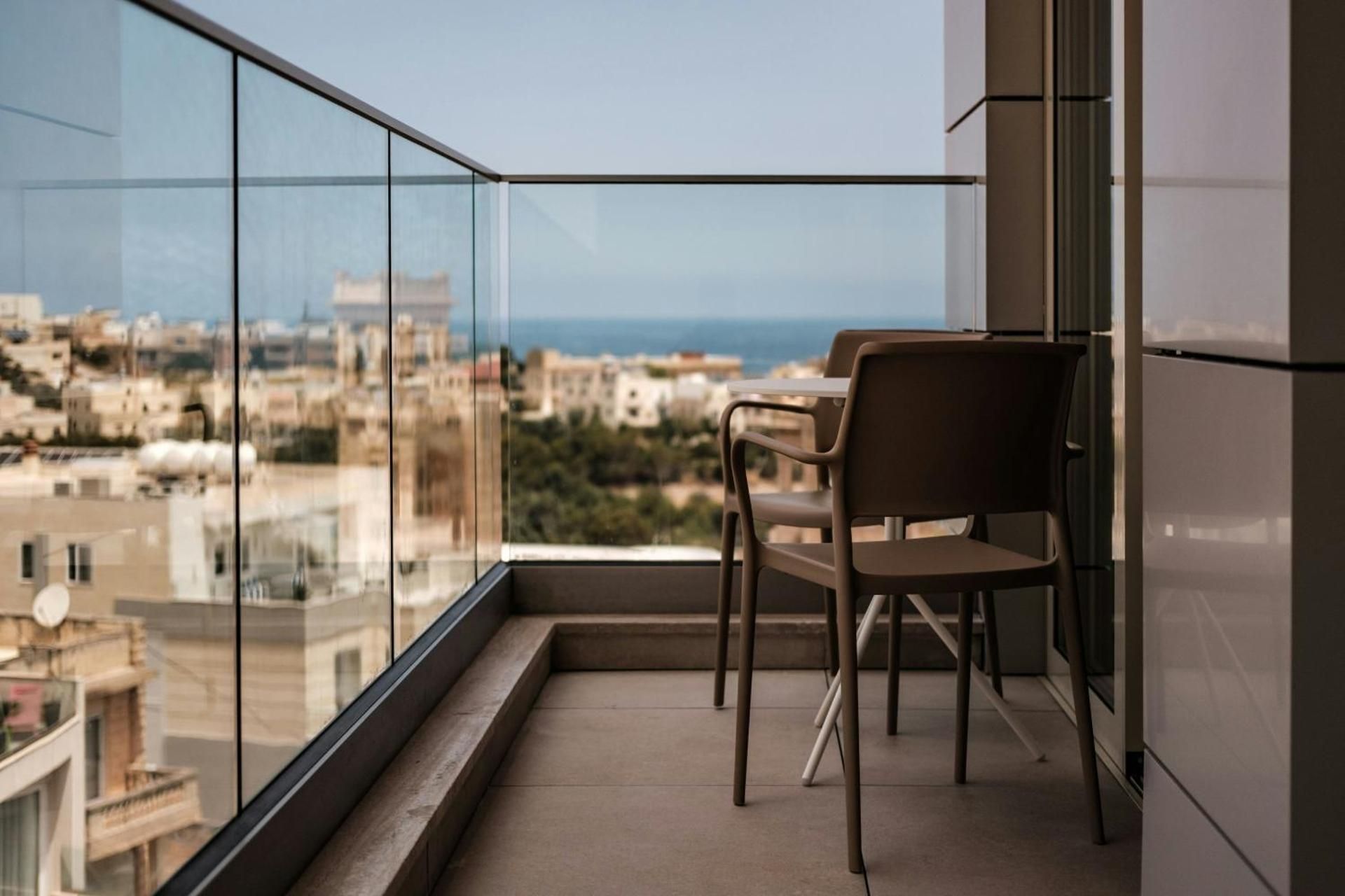 One-Bedroom King Suite with Sofa Bed and Terrace - City View