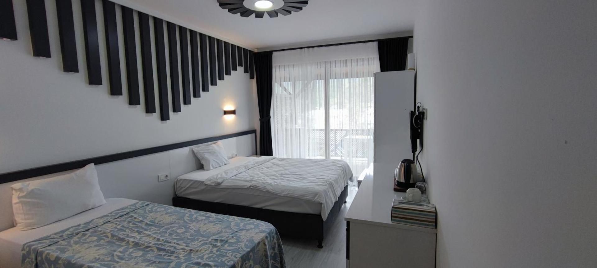 Kaptan Han Butik Otel Deluxe Triple Room with Sea View