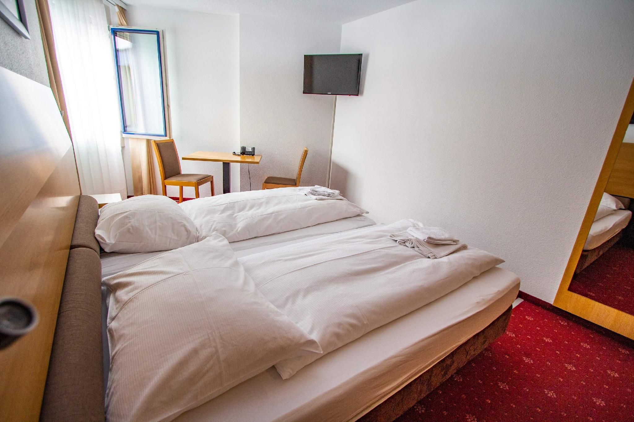 Dreibettzimmer, Triple Room