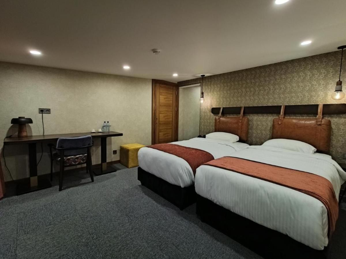 Quadruple Room with Balcony