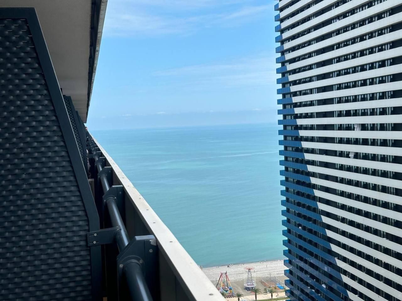 One-Bedroom Apartment with Balcony and Sea View
