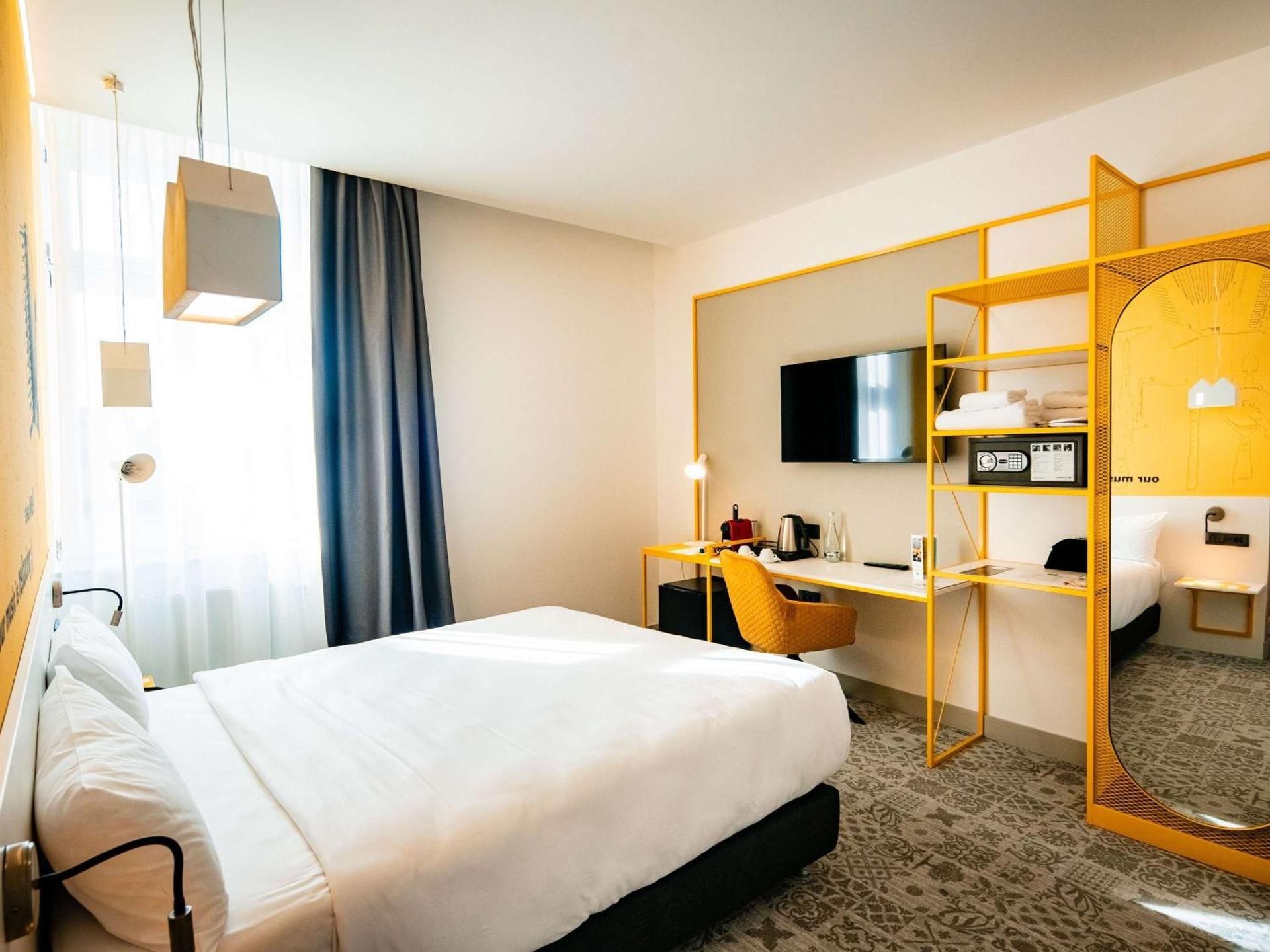 ibis Styles Sibiu Arsenal Family Suite With 1 Double Bed And Sofa Bed