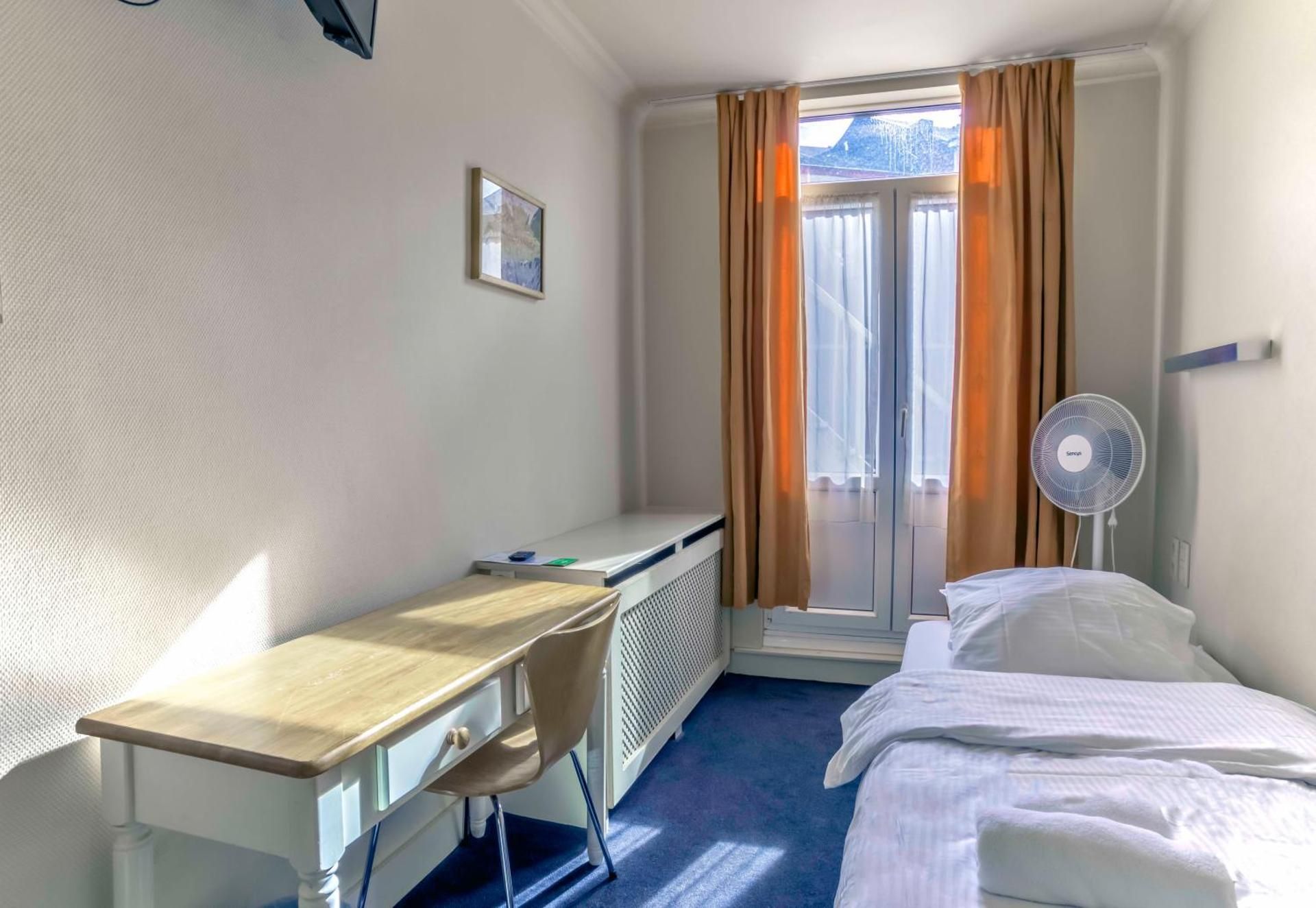 Single Room with Shared Shower and Toilet