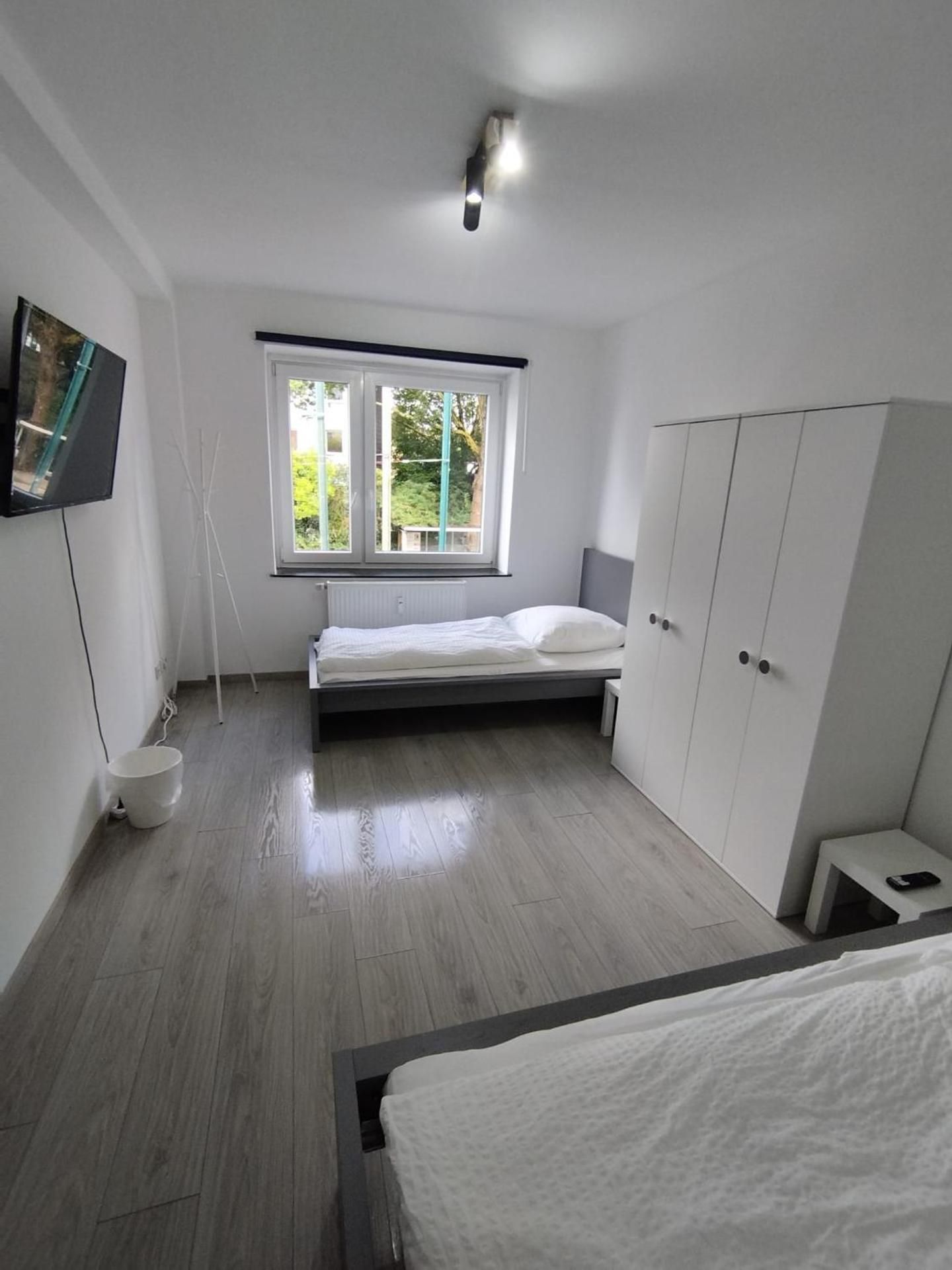 Four-Bedroom Apartment with Balcony 