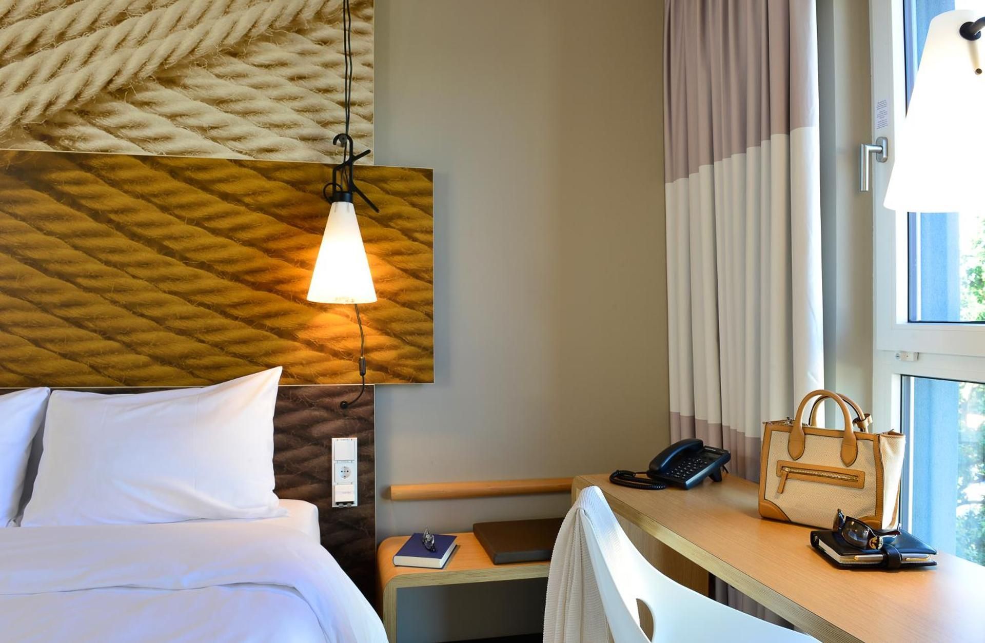 Room with 2 single beds equipped with the new b edding