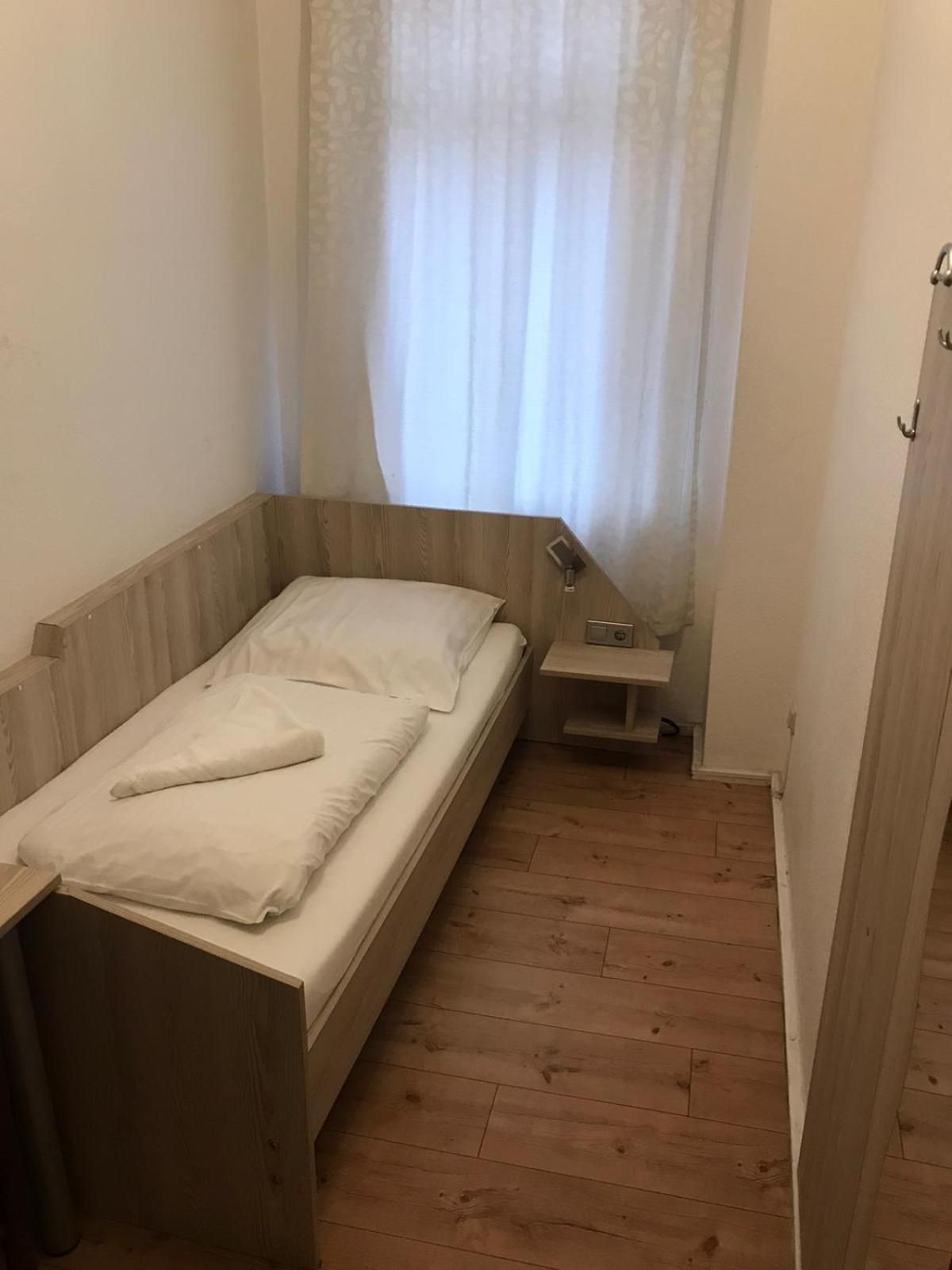 Single Room with Shared Bathroom and Toilet