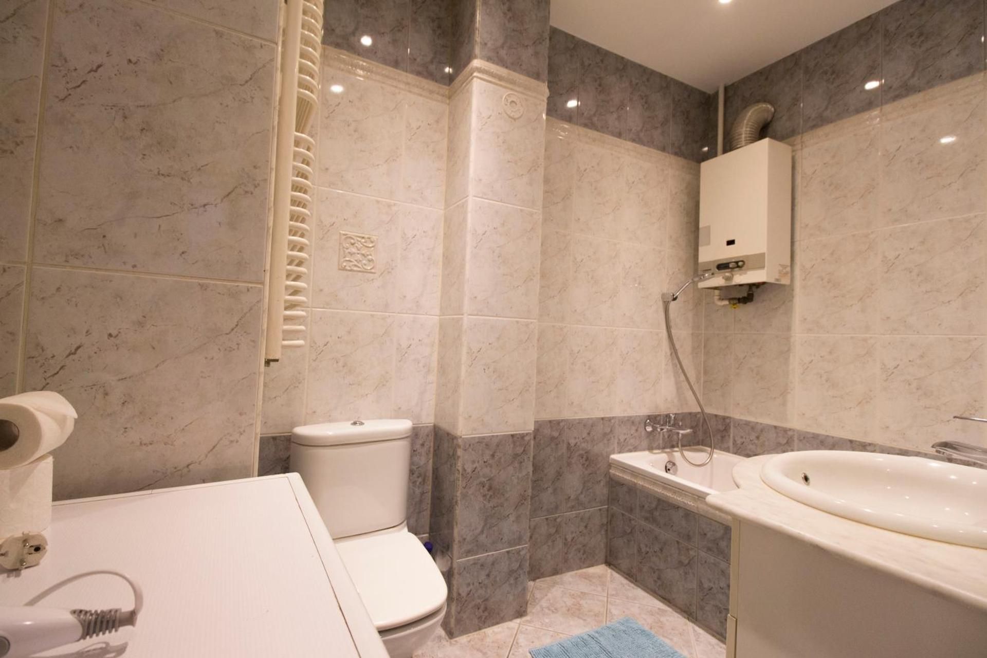 Three-Bedroom Apartment with Balcony