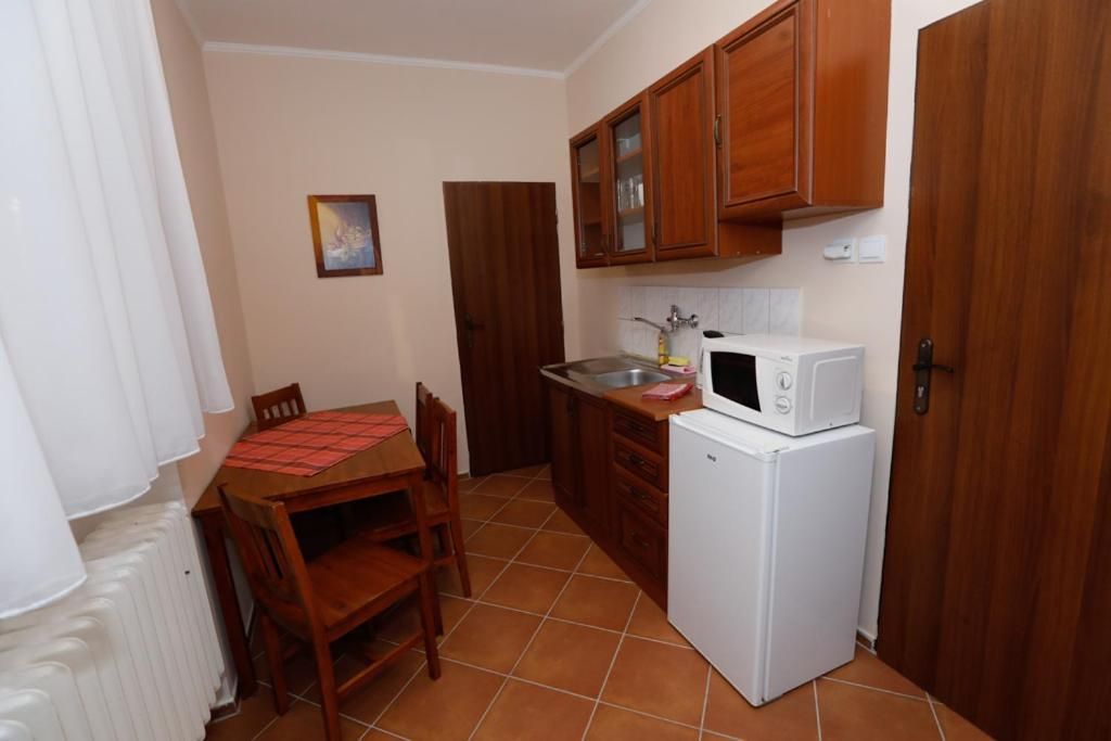 Quadruple Room with Private Bathroom