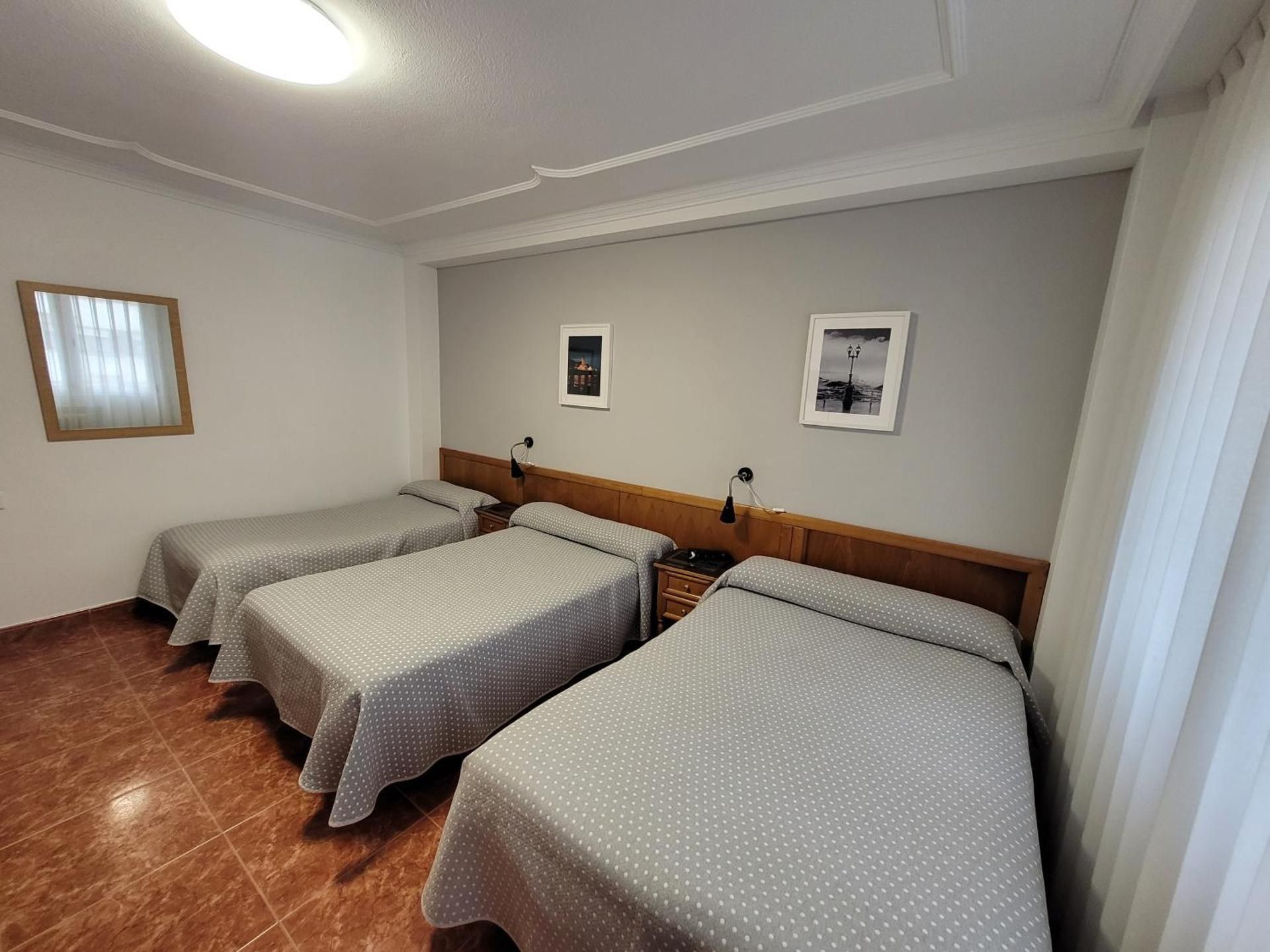 Triple Room with Shared Bathroom