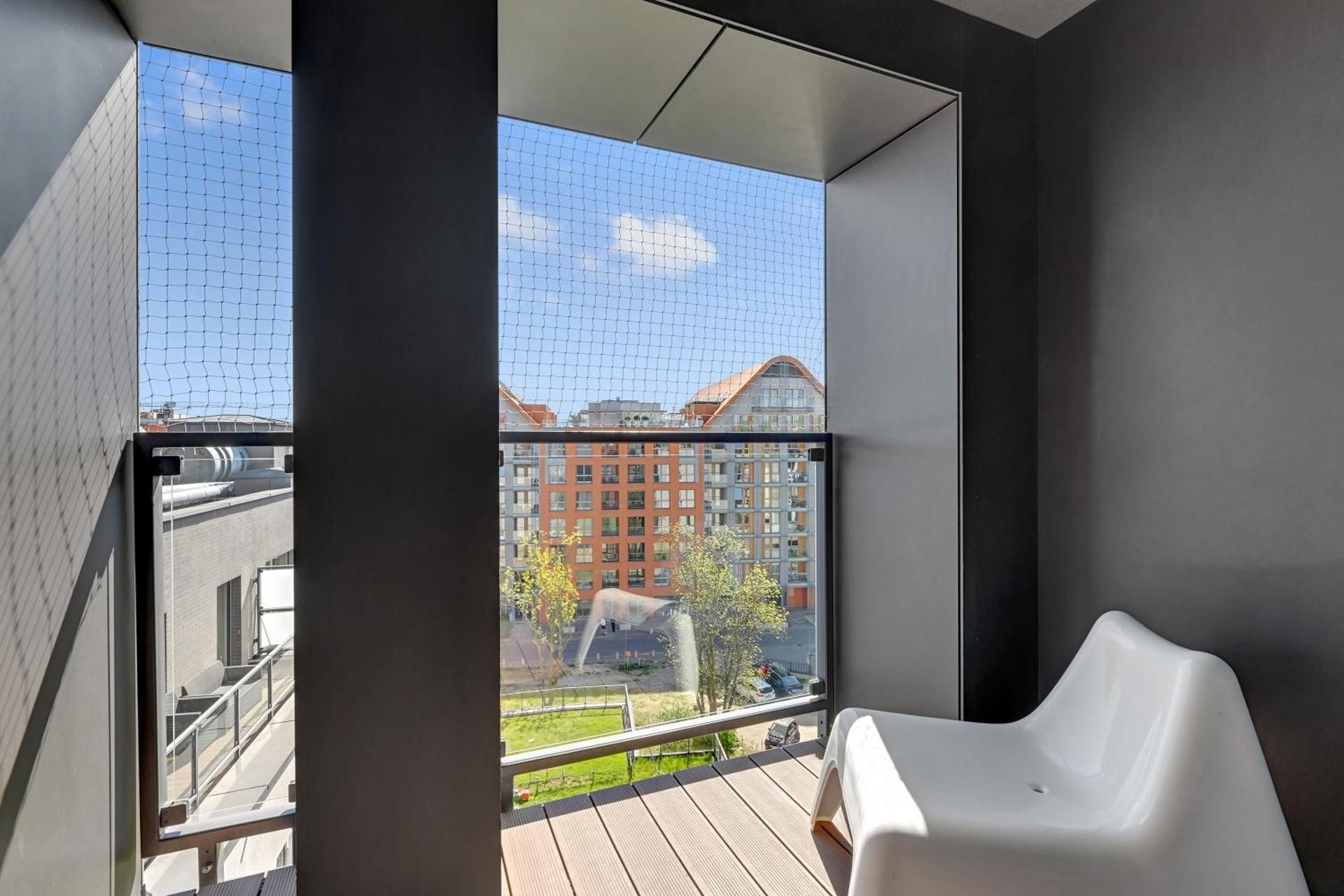 One-Bedroom Apartment with Balcony - 71 Chmielna Street