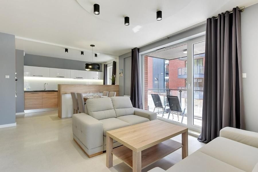 Two-Bedroom Apartment with Balcony and Parking - 13G