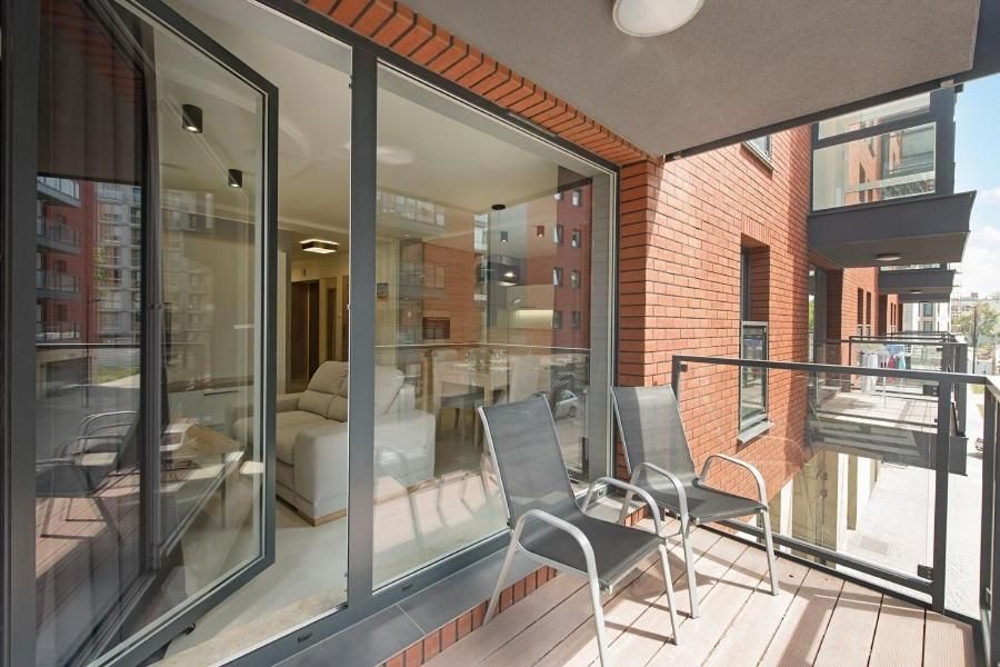 Two-Bedroom Apartment with Balcony and Parking - 13G