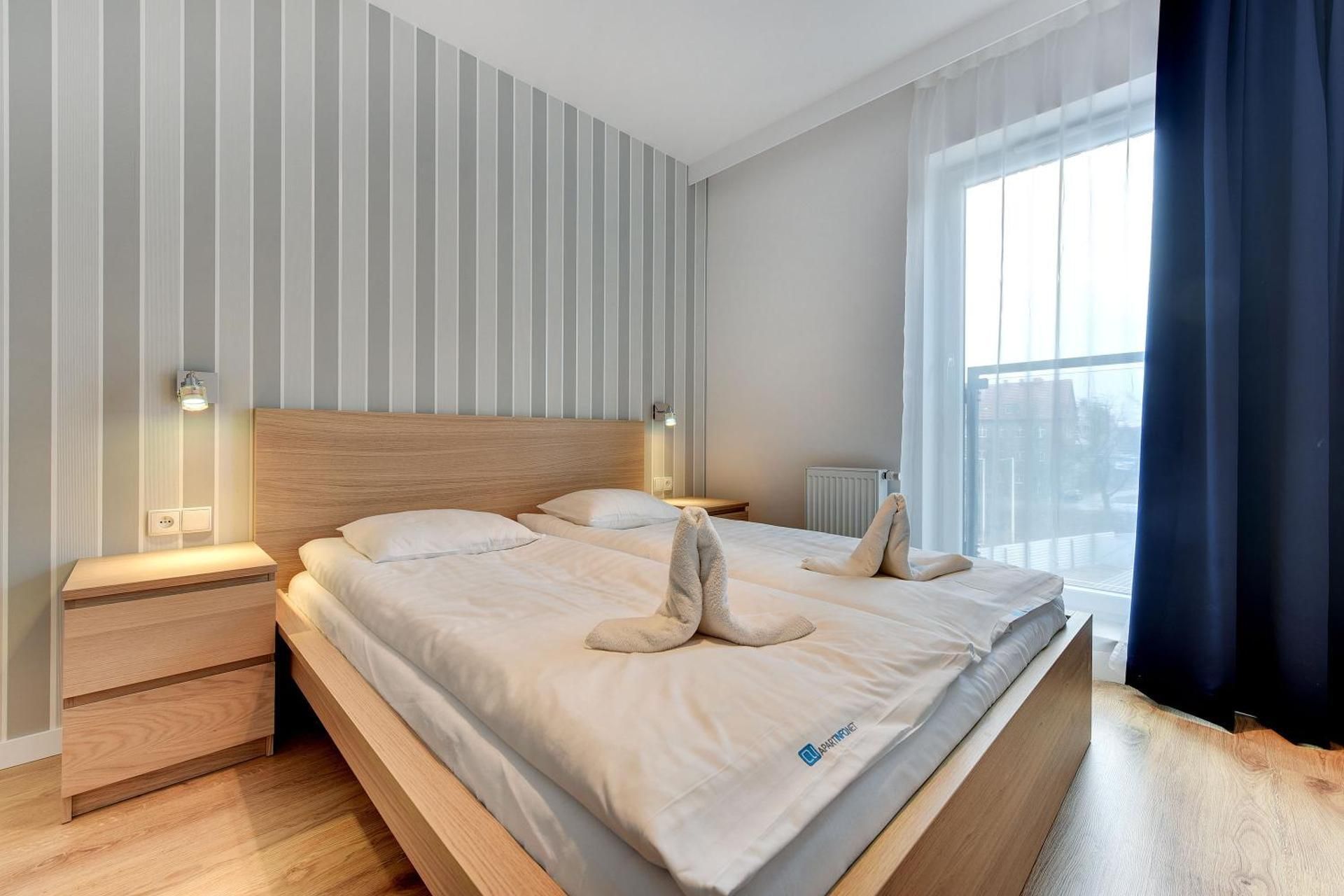 Deluxe One-Bedroom Apartment with Balcony and Parking (4 Adults)