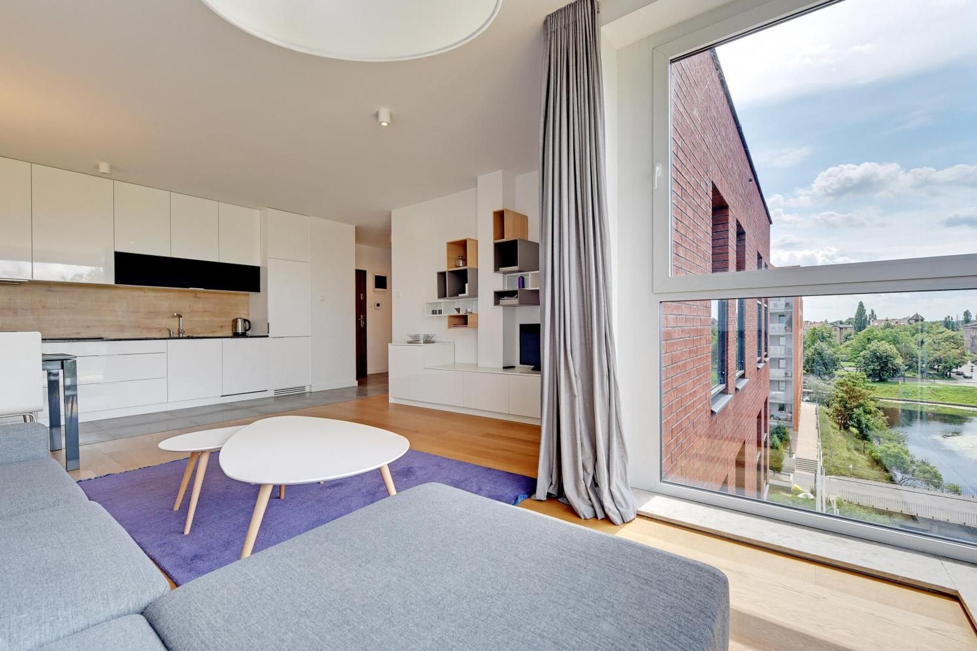 Deluxe One-Bedroom Apartment with River View and Parking (4 Adults)
