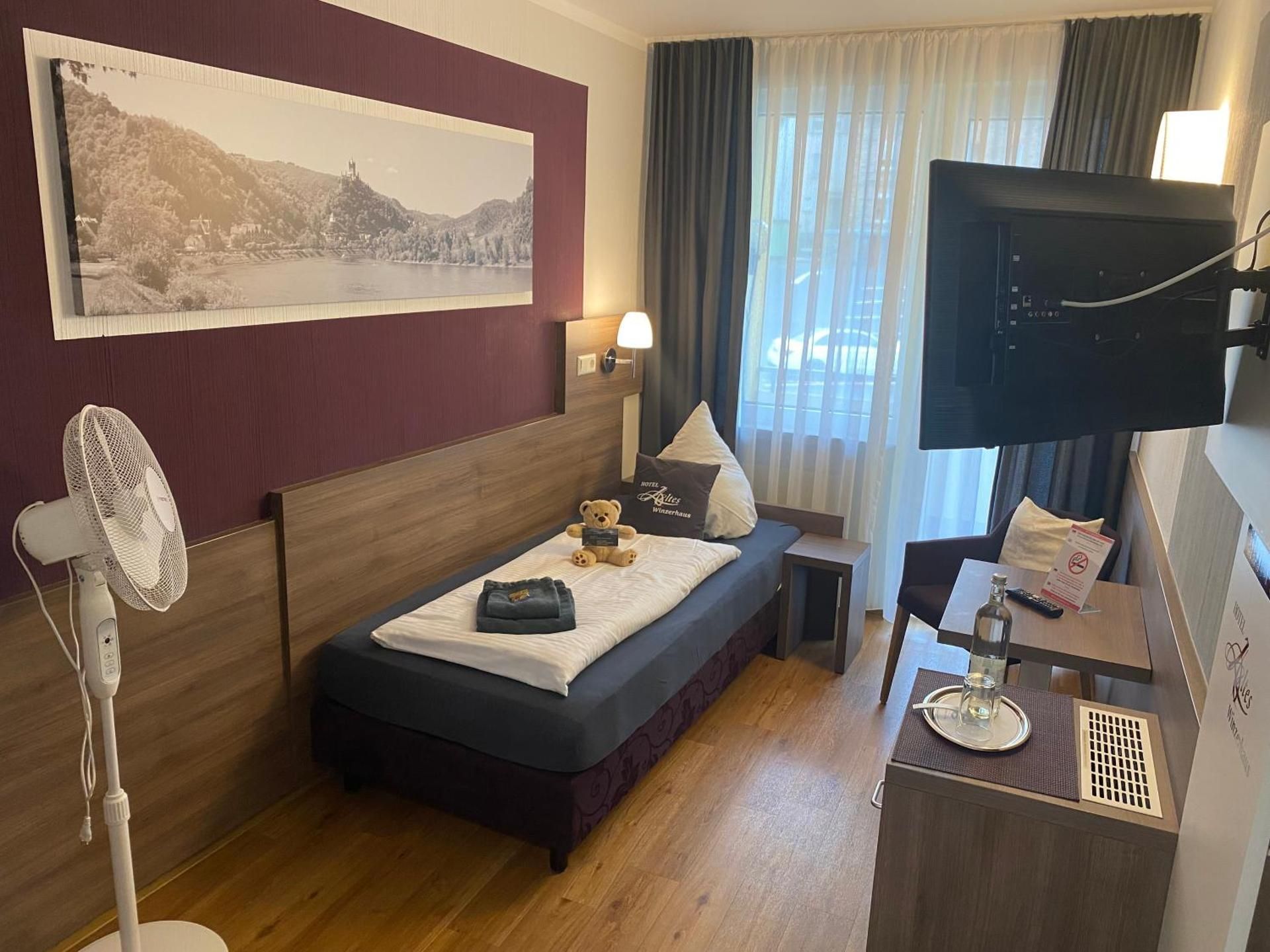 Single Room With Balcony And Residential Area View