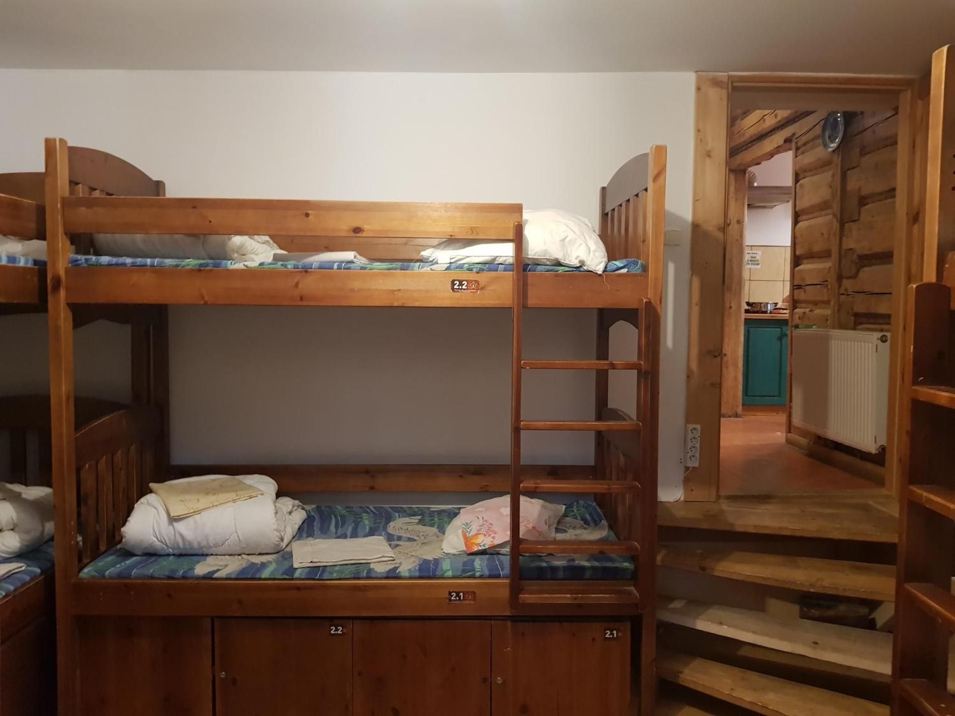 Bed in 8-Person bedroom with Shared Bathroom