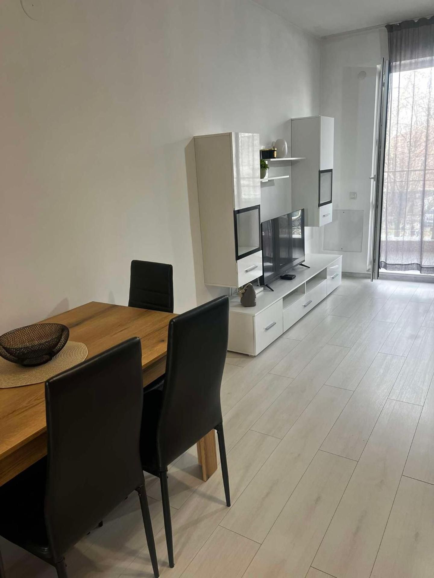 One-Bedroom Apartment with Balcony and City View