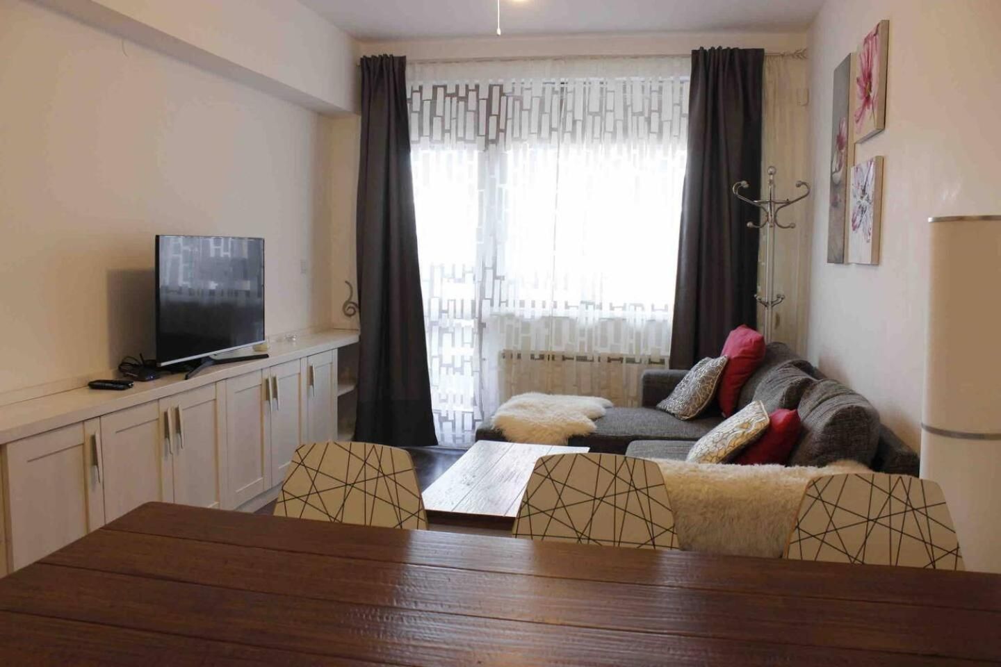 One-Bedroom Apartment with Balcony and City View