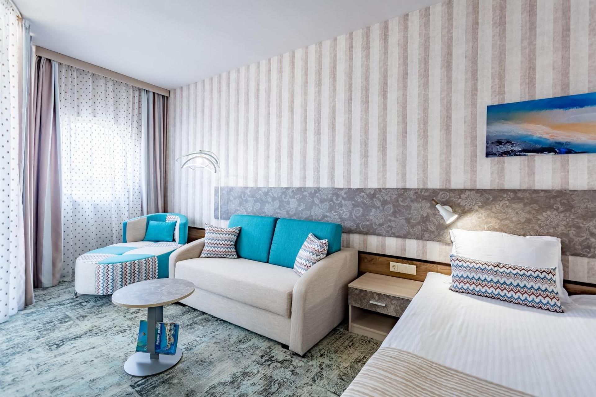 Junior Suite with Side Sea View (3 Adults + 1 Child)